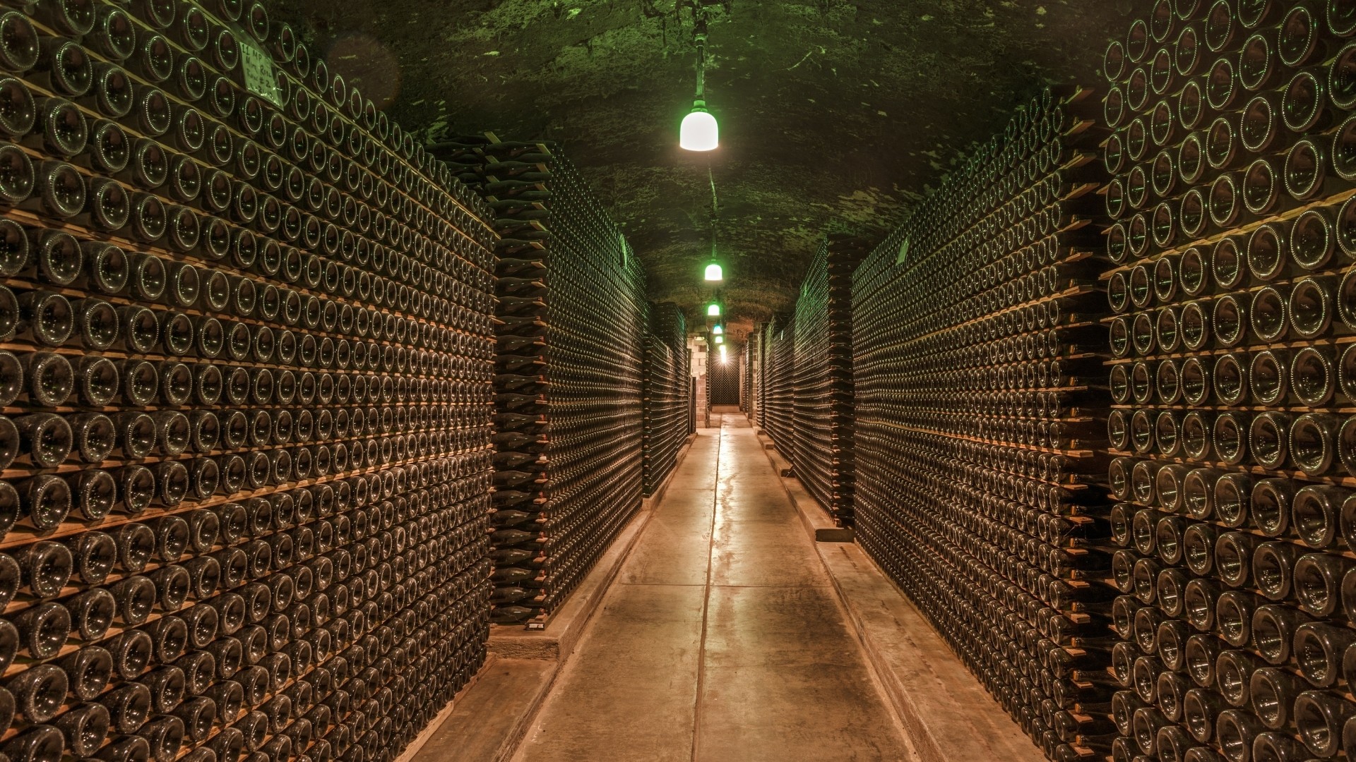 Wine cellar hallway with stacked bottles in California HD Wallpaper
