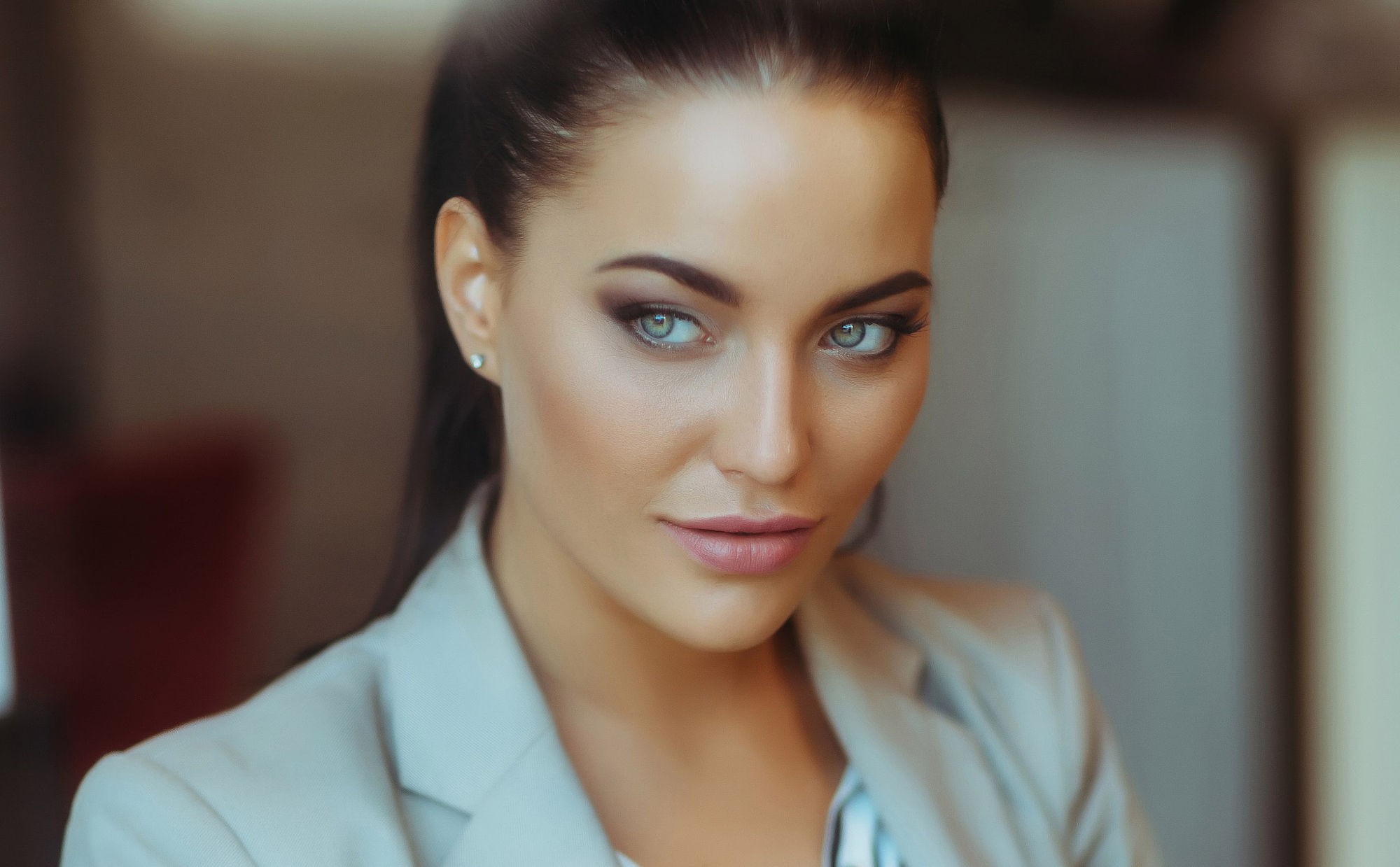 Woman in white jacket with brunette hair HD Wallpaper