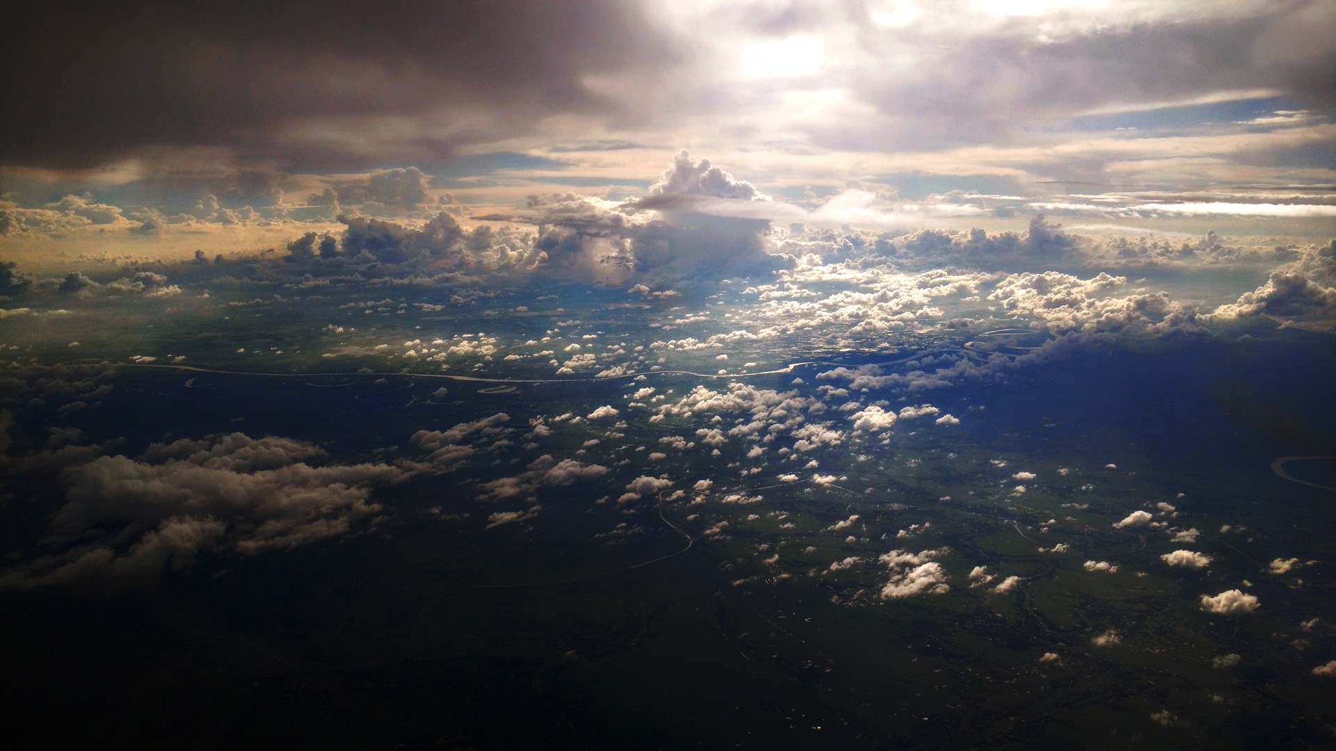 Aerial view of Bangladesh with dramatic clouds HD Wallpaper