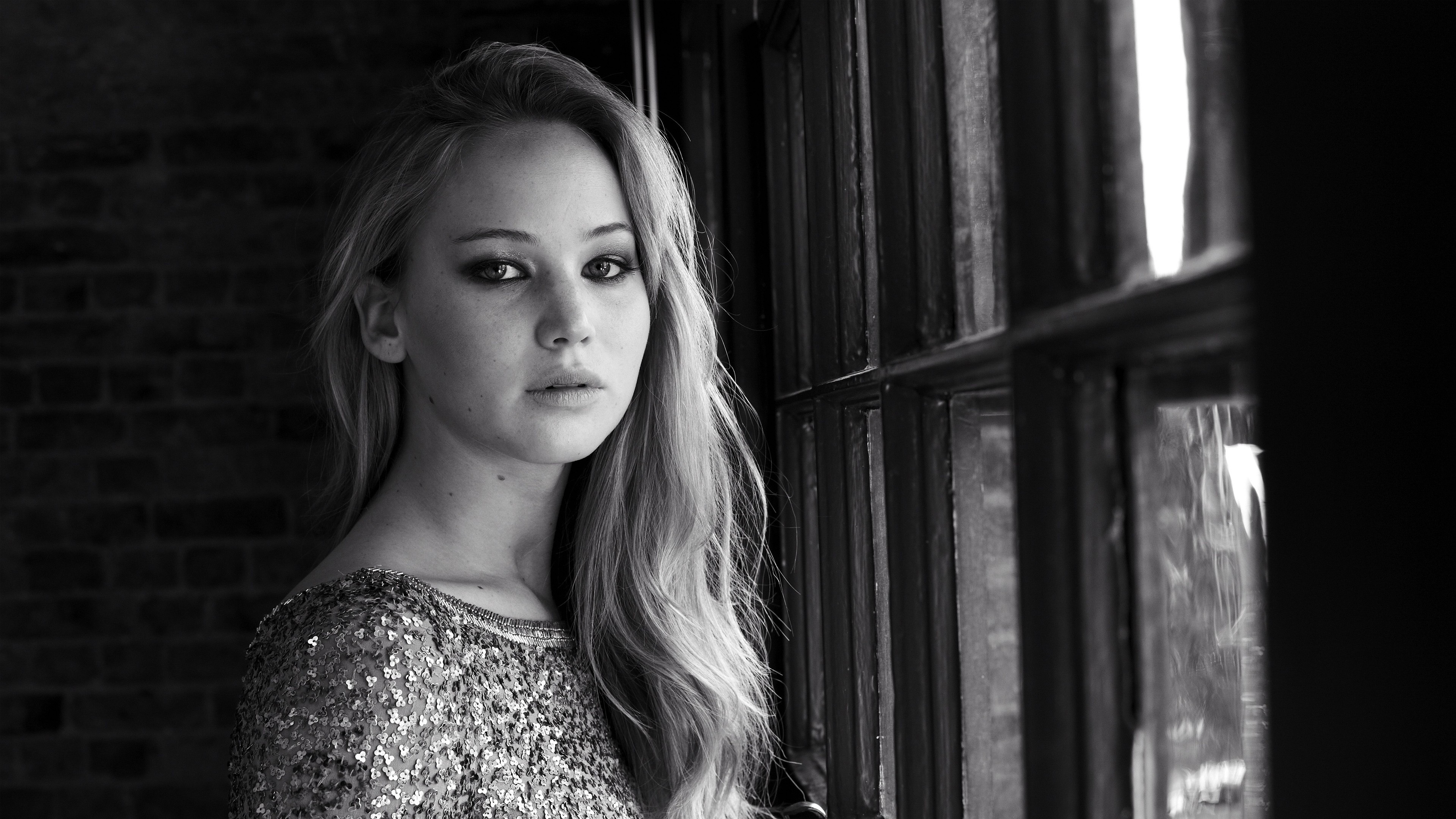 Jennifer Lawrence in a sequined dress by a window HD Wallpaper