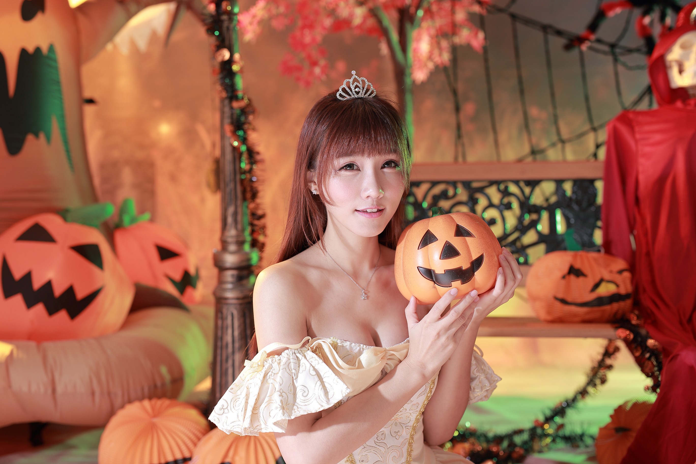 Ji Xin Qiao in Halloween costume holding a pumpkin HD Wallpaper