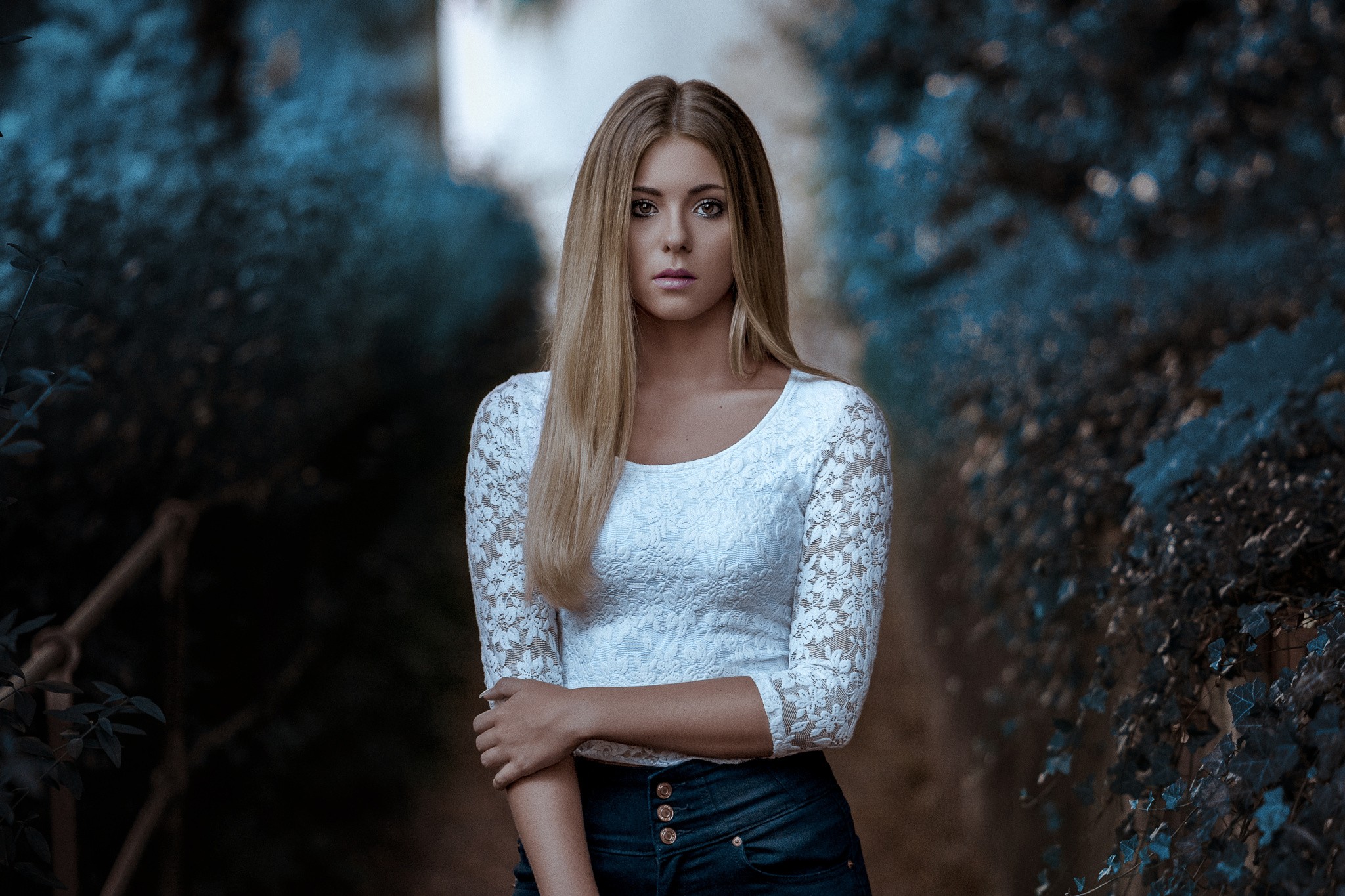 Woman with blonde hair in white lace top outdoors HD Wallpaper