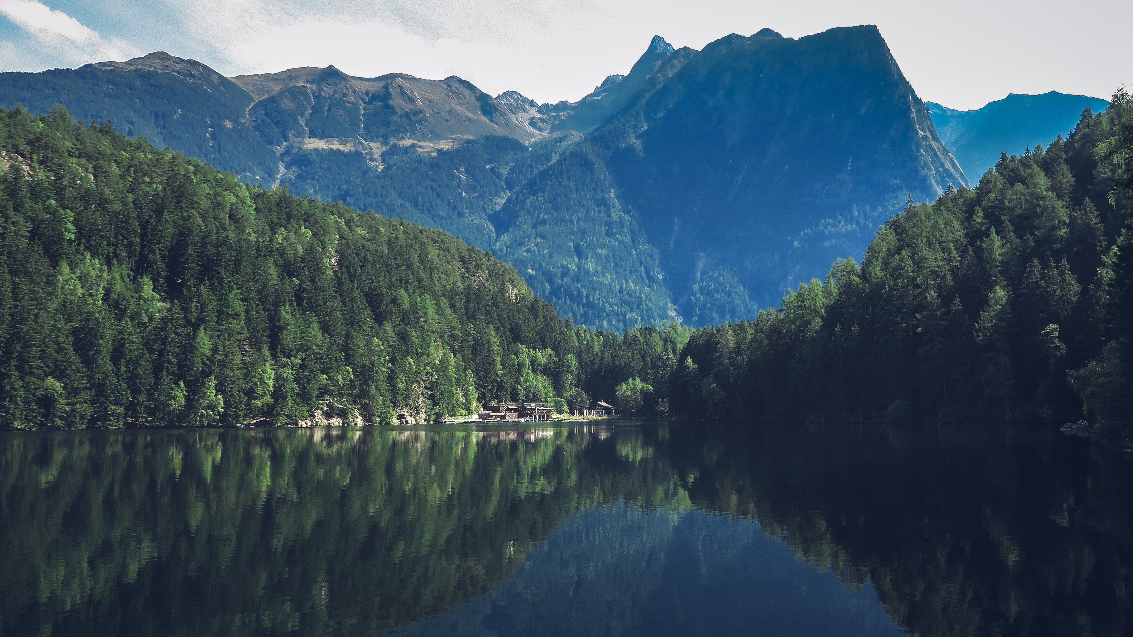 Lake and mountains with forest reflection HD Wallpaper