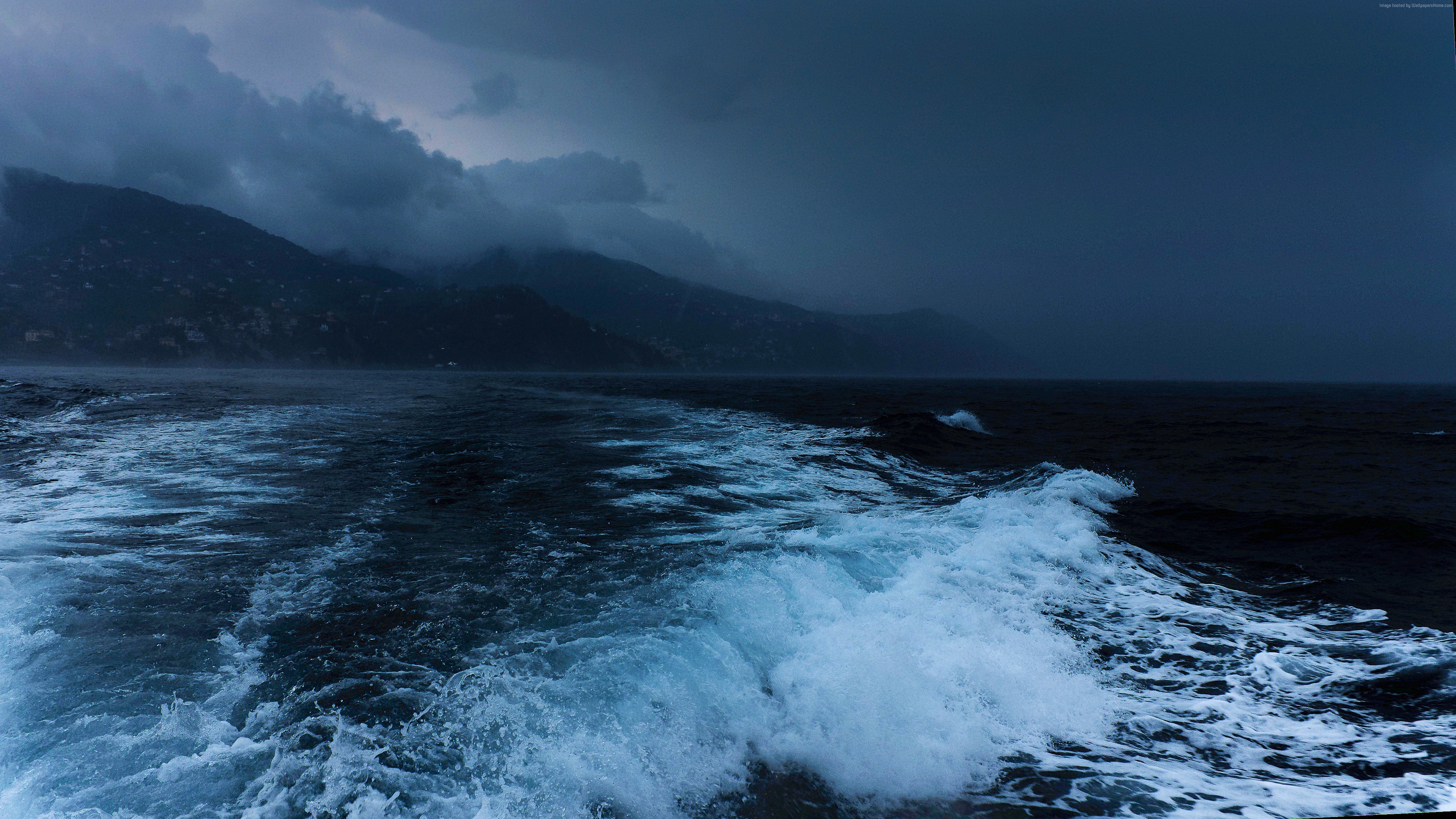 Stormy sea with waves and mountains HD Wallpaper