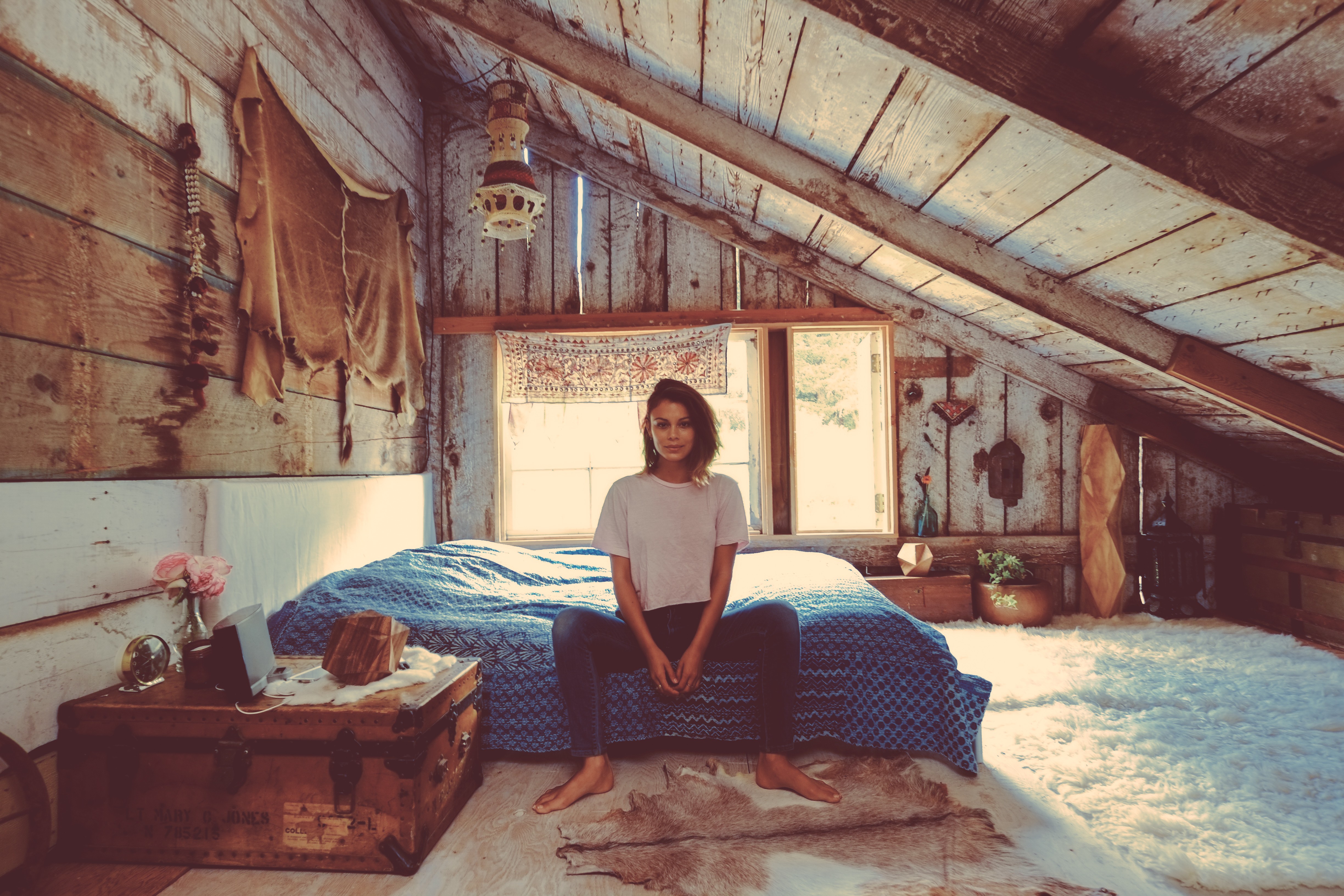 Nathalie Kelley in a rustic attic bedroom HD Wallpaper
