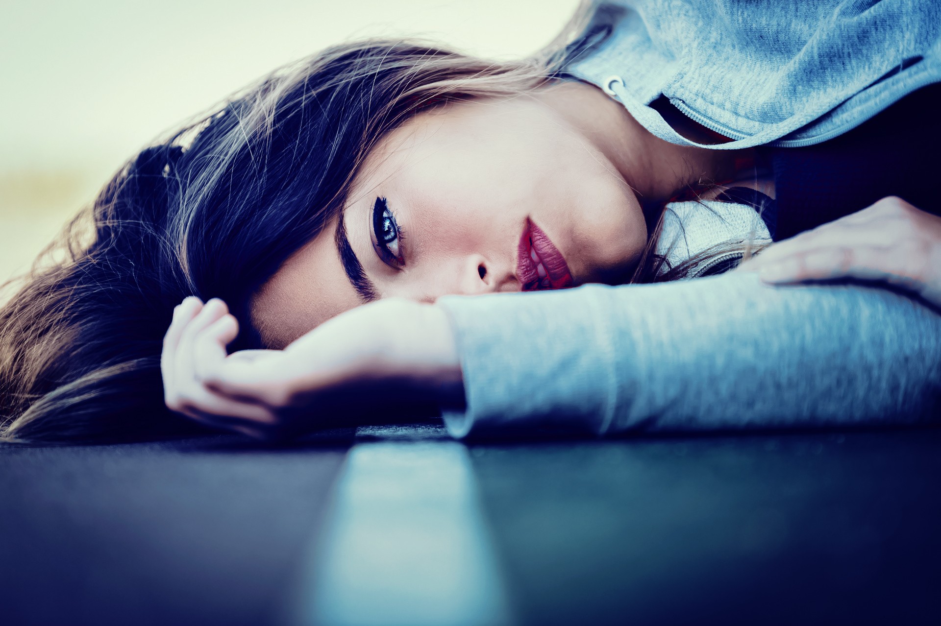 Woman lying on a road HD Wallpaper