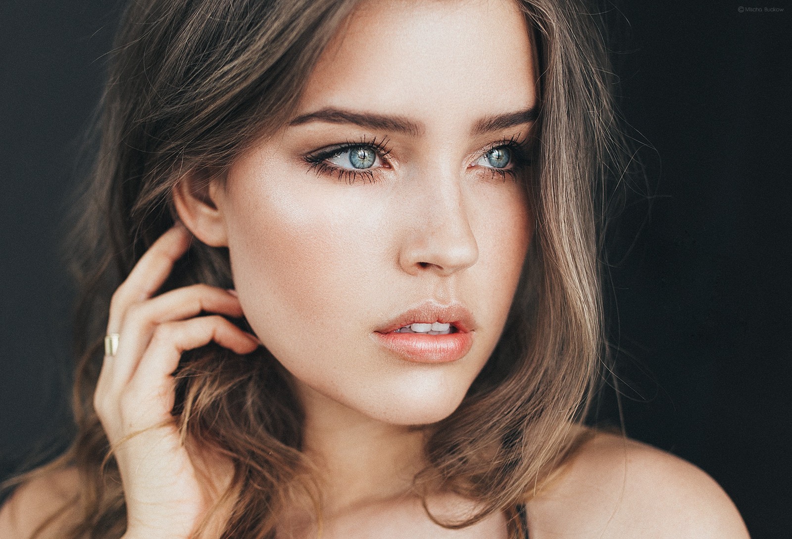 Portrait of a young woman with blue eyes HD Wallpaper
