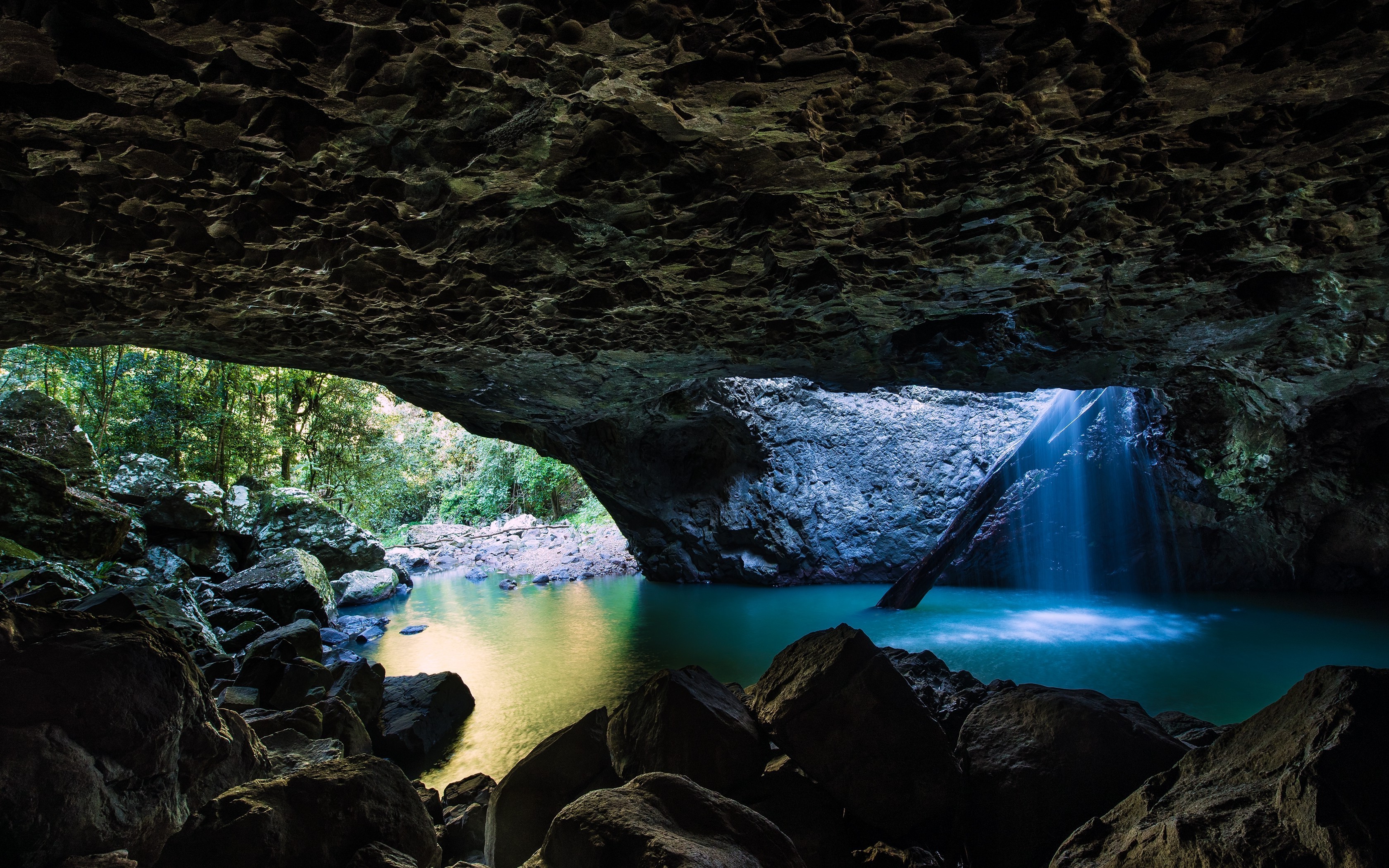 Cave with waterfall and pool HD Wallpaper