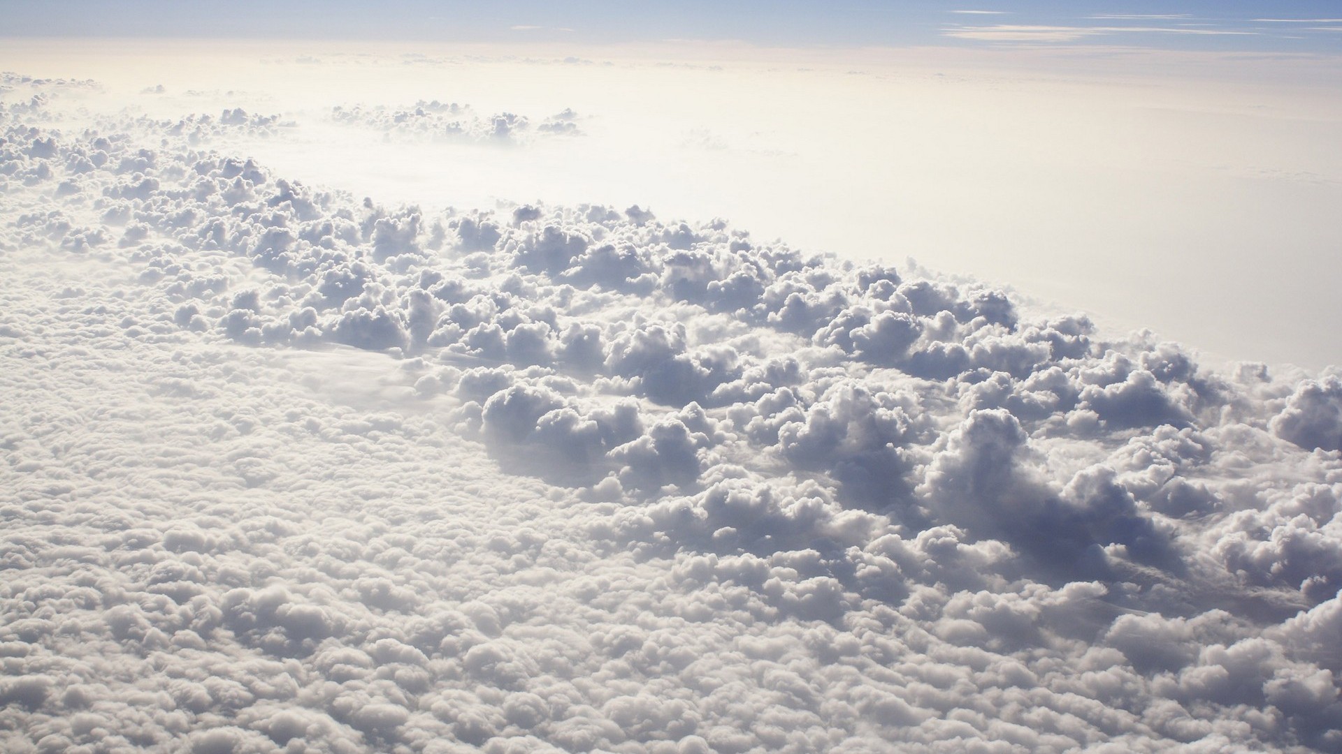 Sea of clouds from above HD Wallpaper