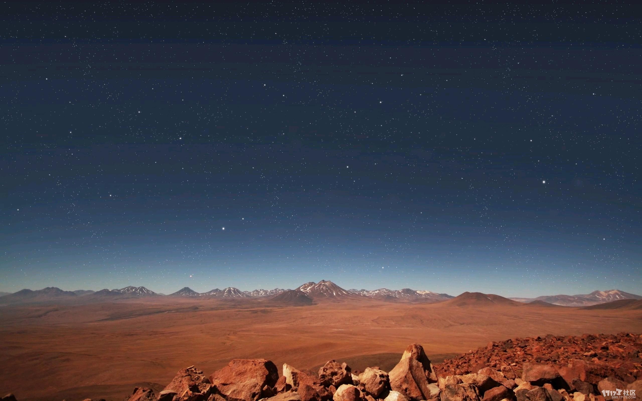 Desert landscape under a starry night sky HD Wallpaper