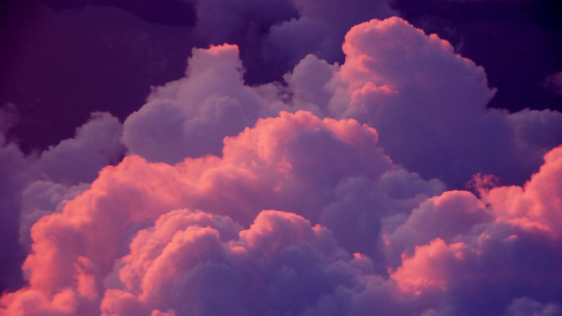 Pink and purple clouds in the night sky HD Wallpaper