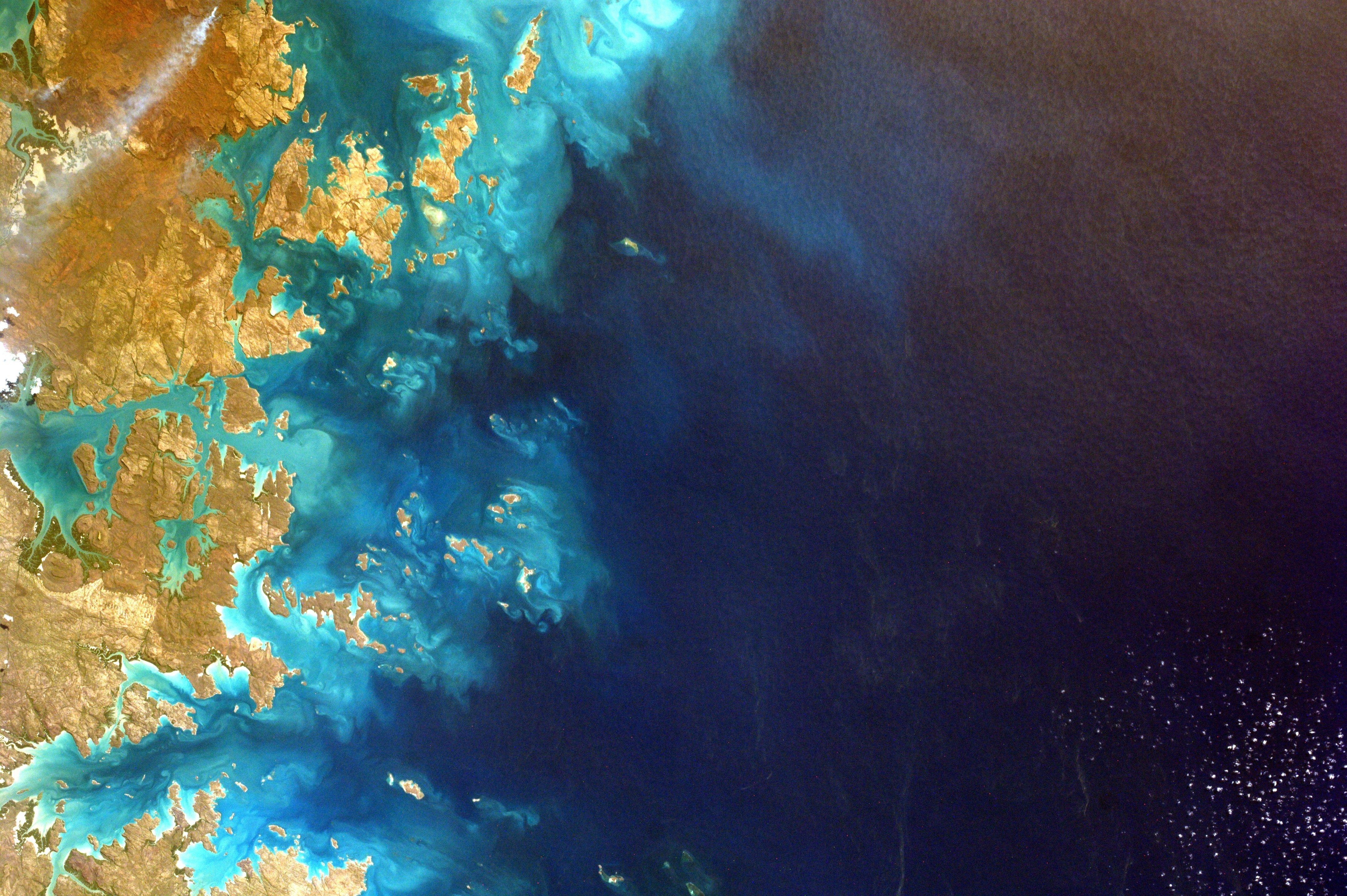 NASA satellite image of Earth's coastline and ocean HD Wallpaper