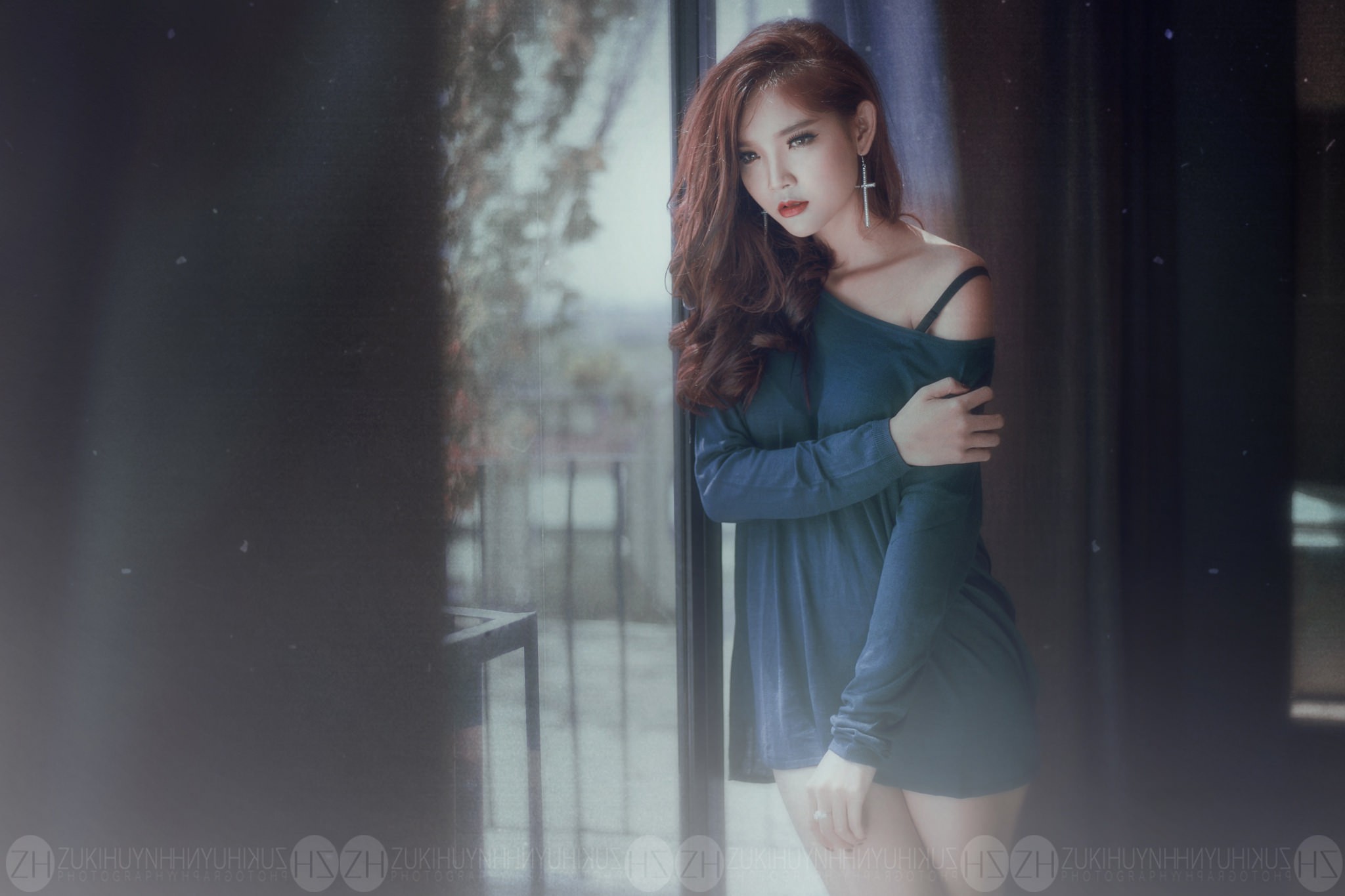 Asian woman in a blue dress by the window HD Wallpaper