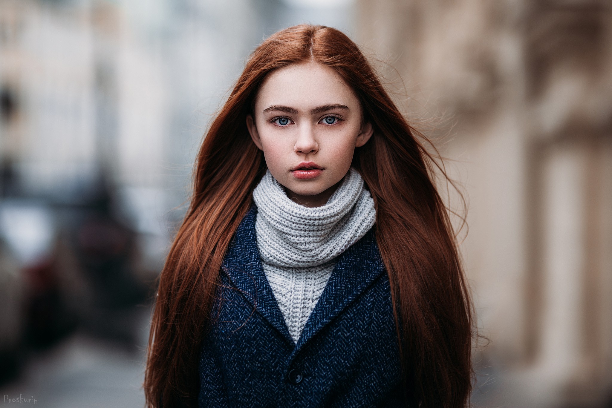 Young redhead woman in a black coat and scarf HD Wallpaper