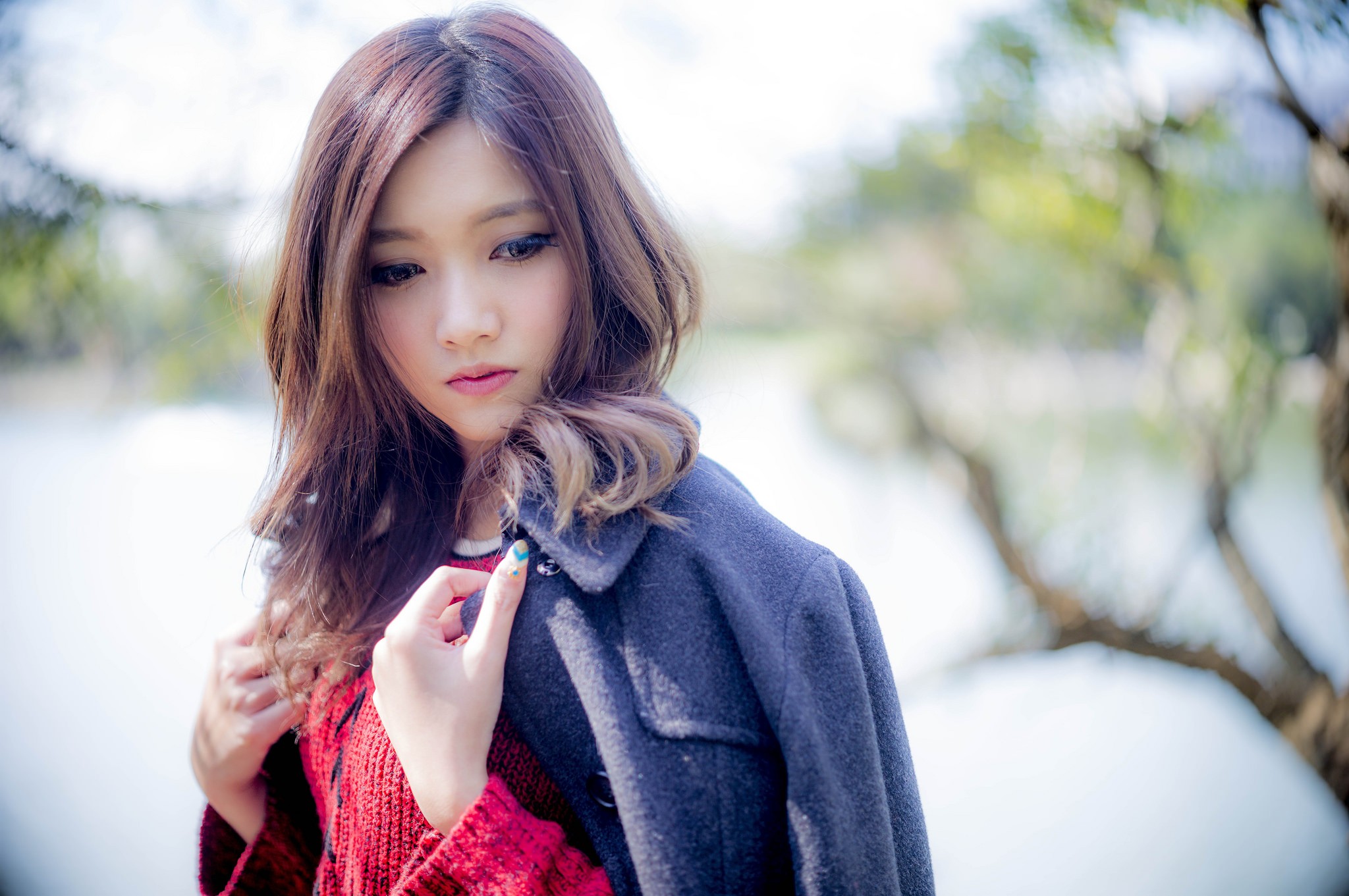 Asian woman with long brown hair wearing a red sweater and coat HD Wallpaper