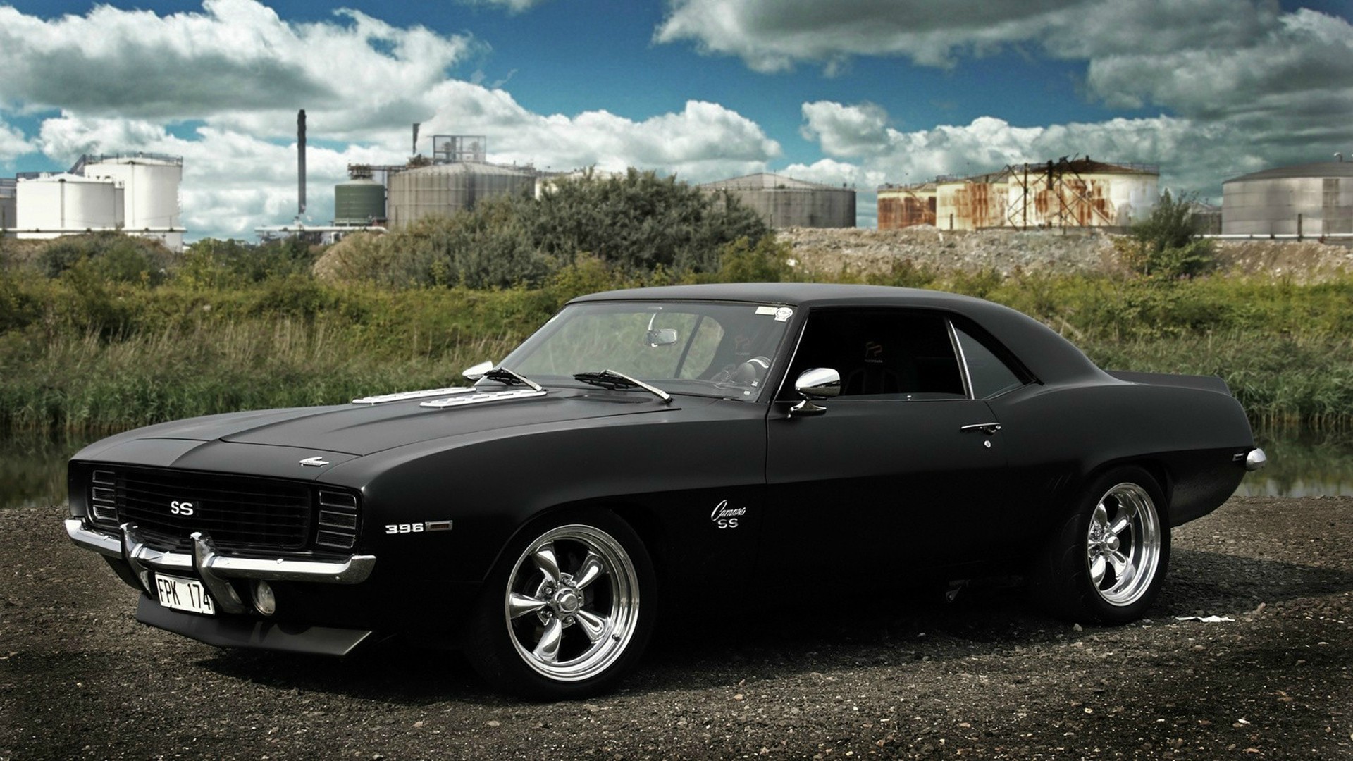 Black 1969 Chevrolet Camaro SS parked outdoors HD Wallpaper