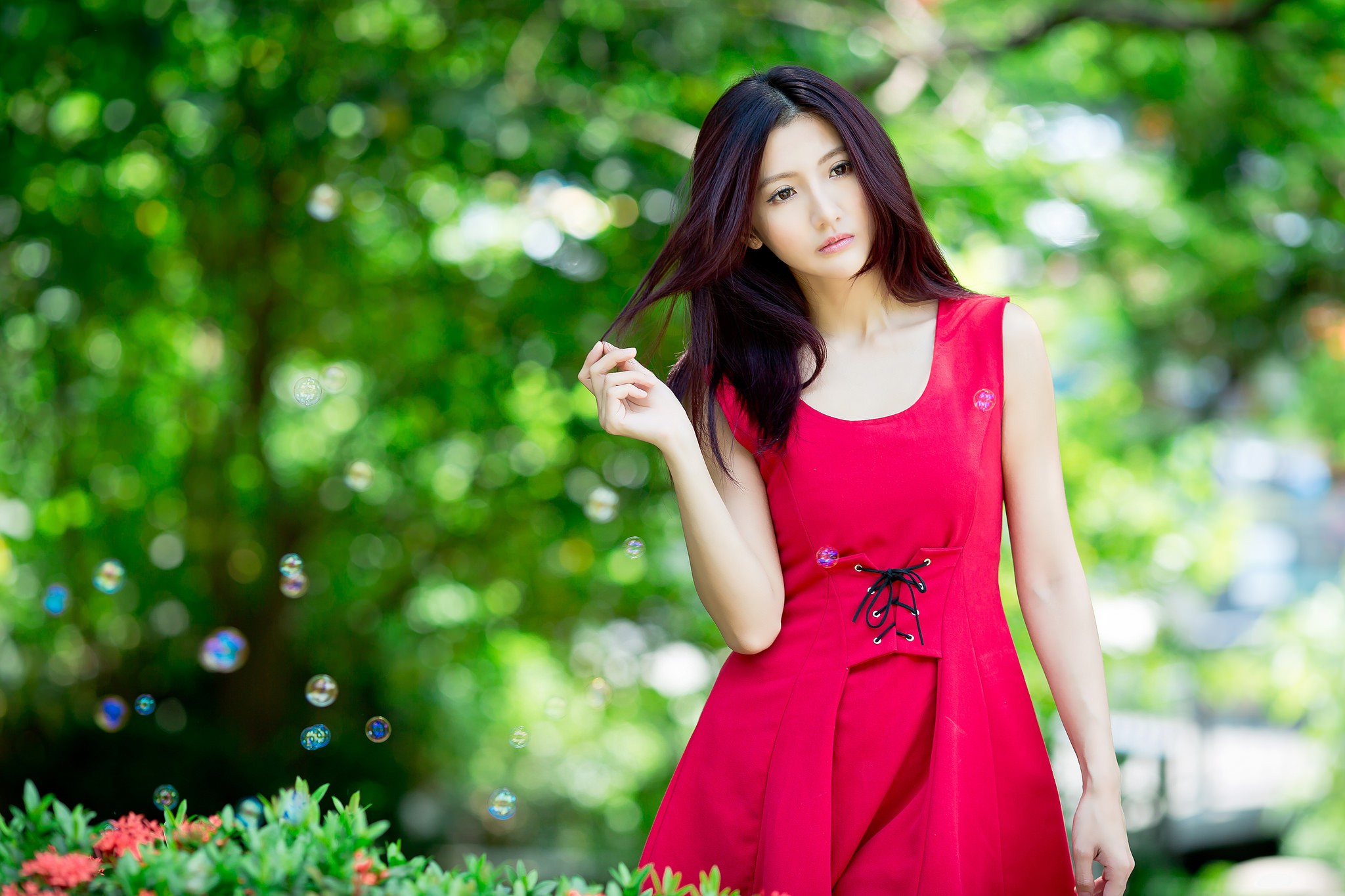 Asian woman in red dress with bubbles HD Wallpaper