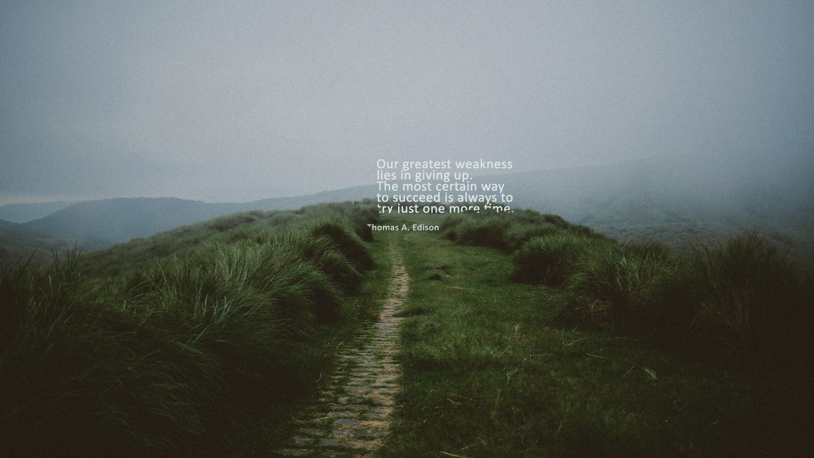 Thomas A. Edison quote on a misty mountain path HD Wallpaper