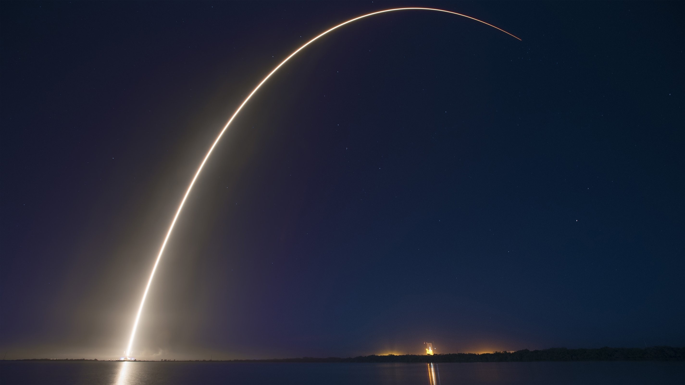 Rocket Launch Trail Over Water at Night HD Wallpaper
