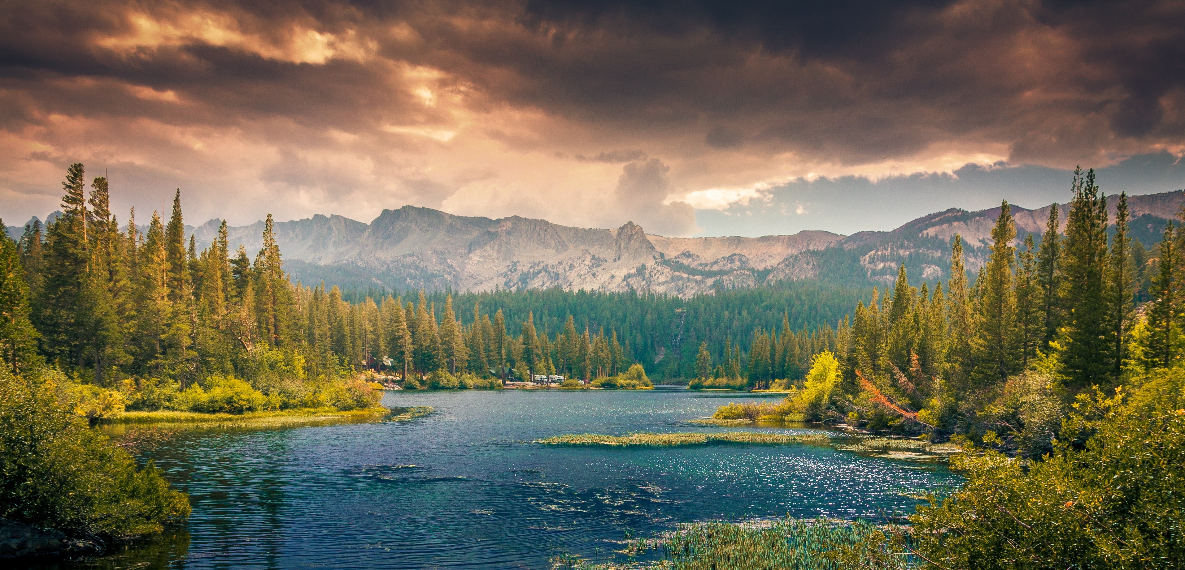 Lake and mountains with forest under cloudy sky HD Wallpaper