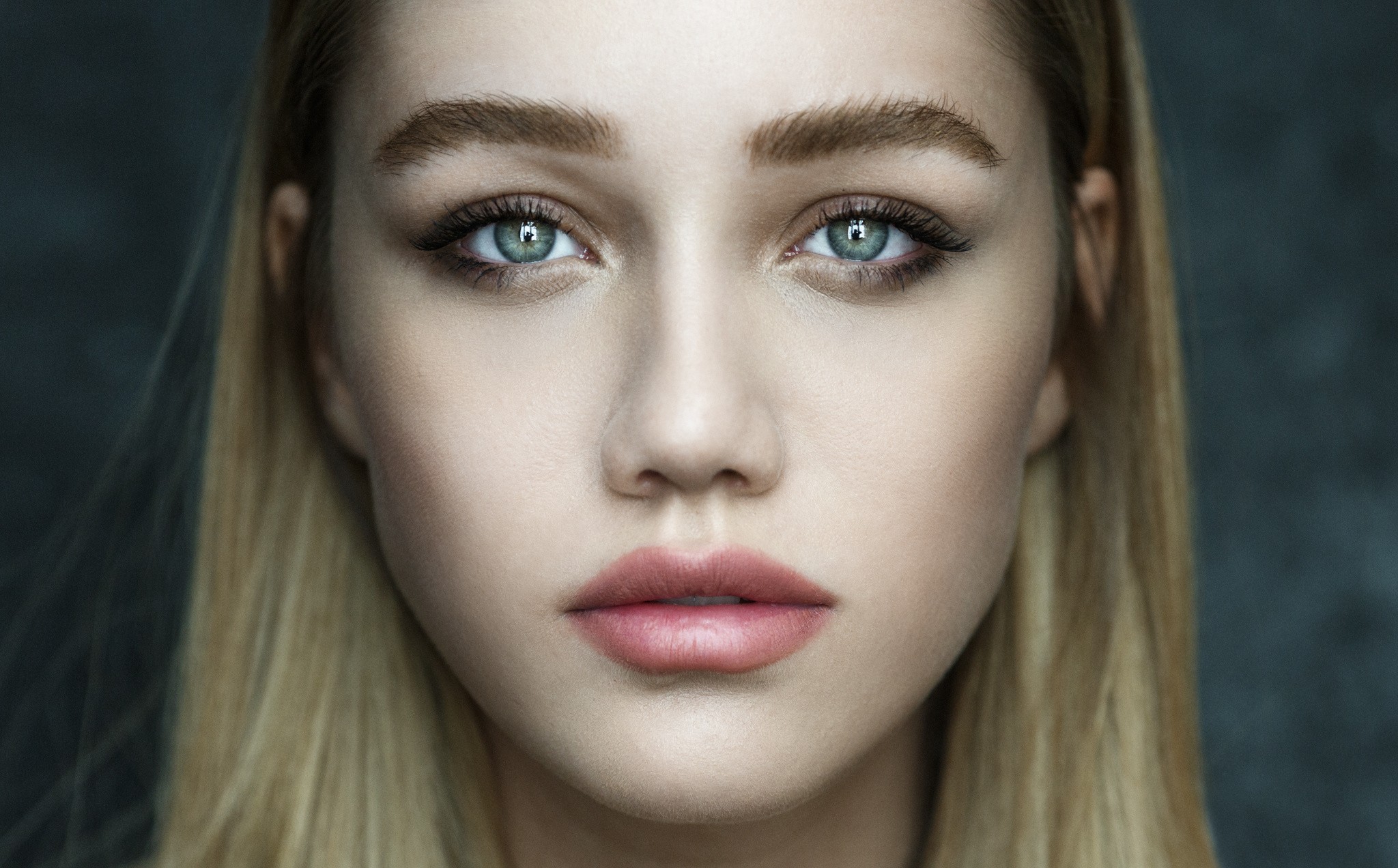Portrait of a blonde woman with blue eyes HD Wallpaper