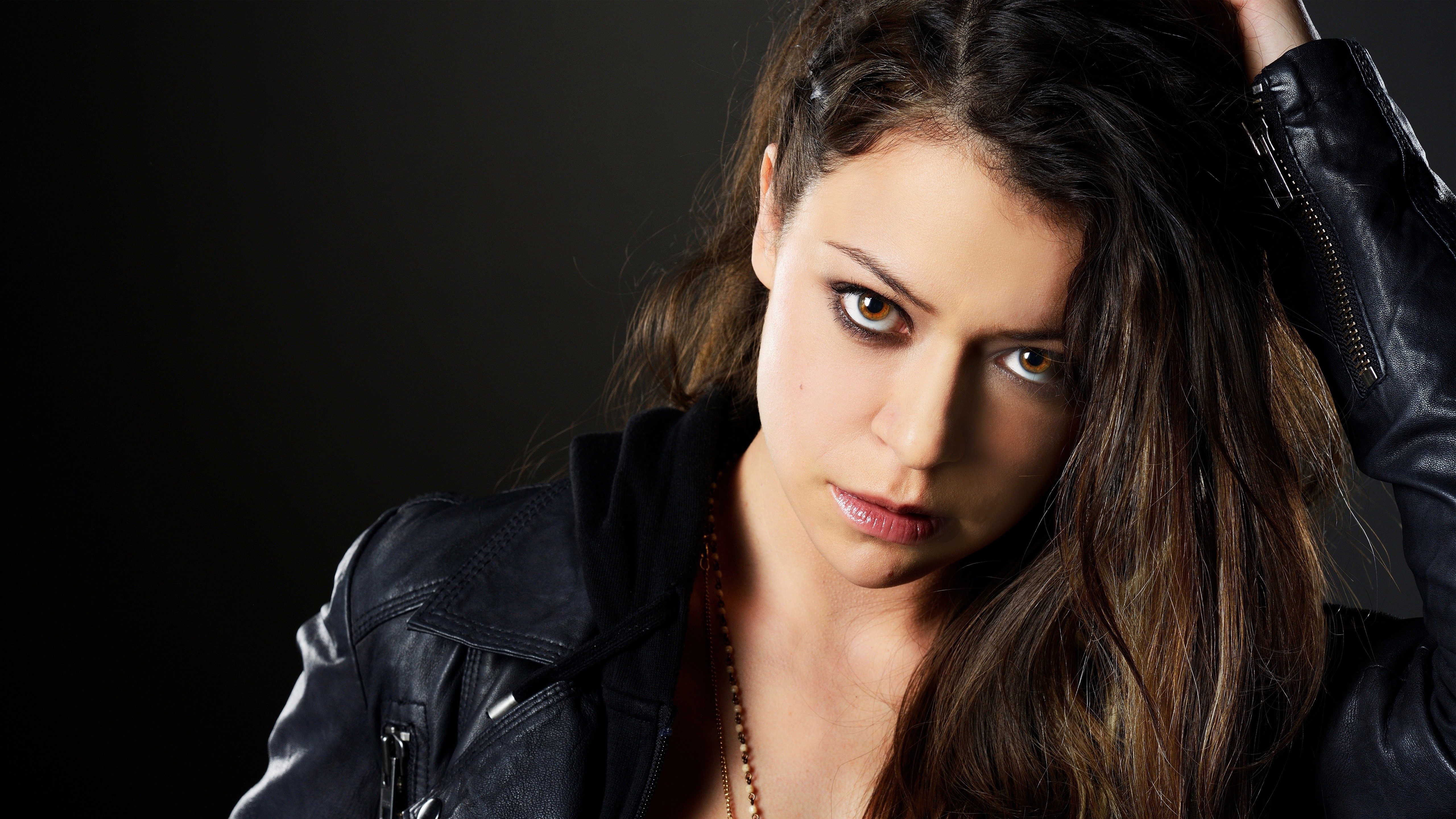 Tatiana Maslany in a black leather jacket HD Wallpaper