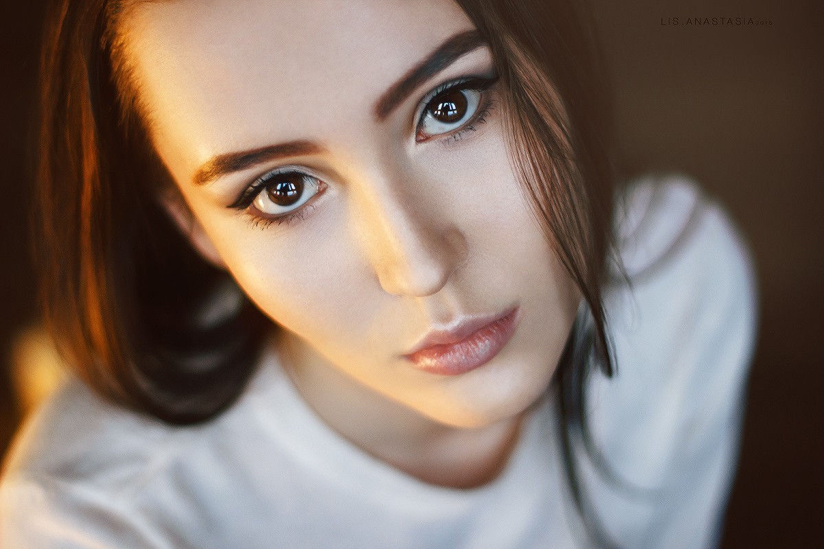 Portrait of a young woman with dark hair HD Wallpaper