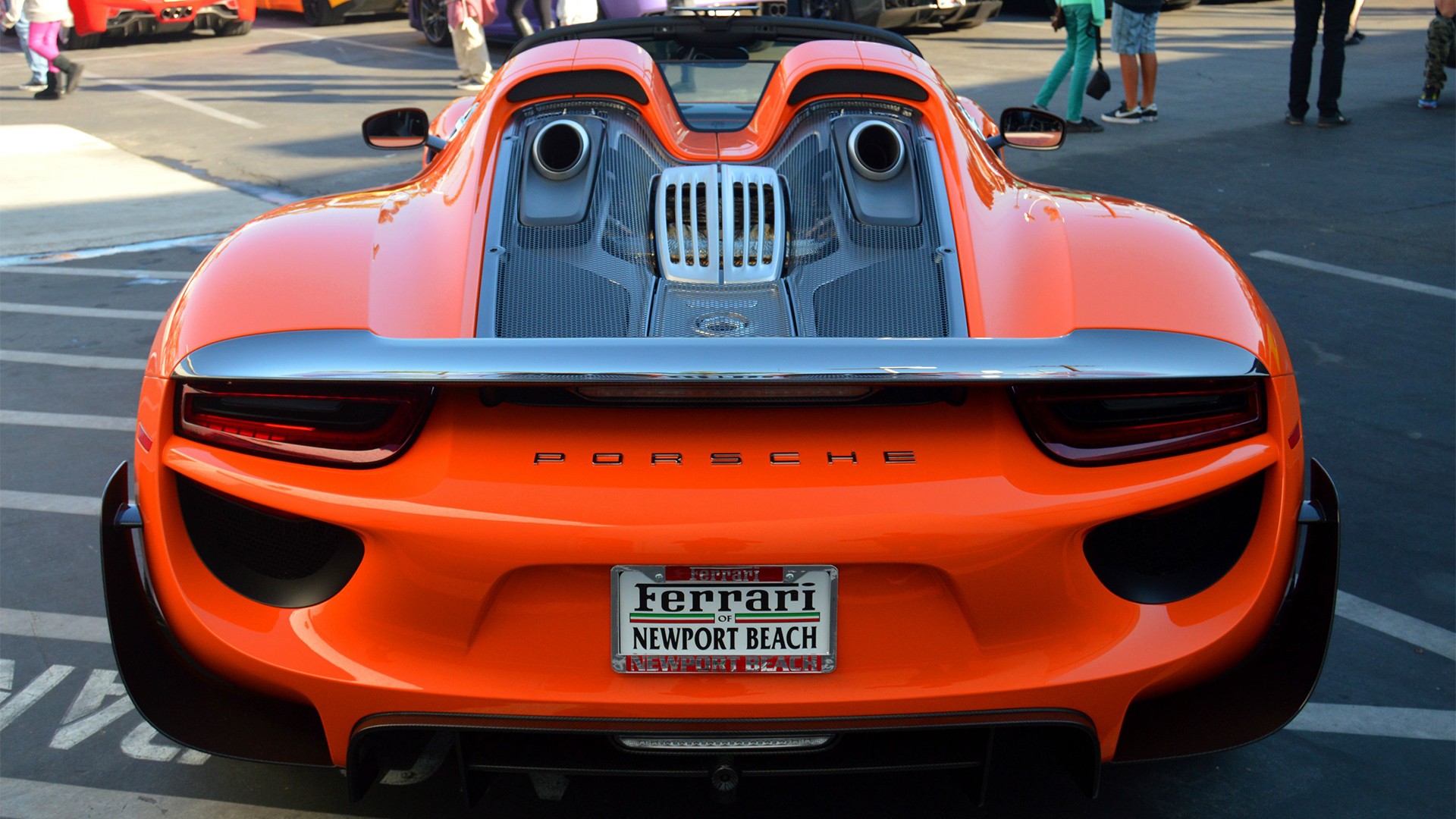 Rear view of an orange Porsche 918 Spyder HD Wallpaper