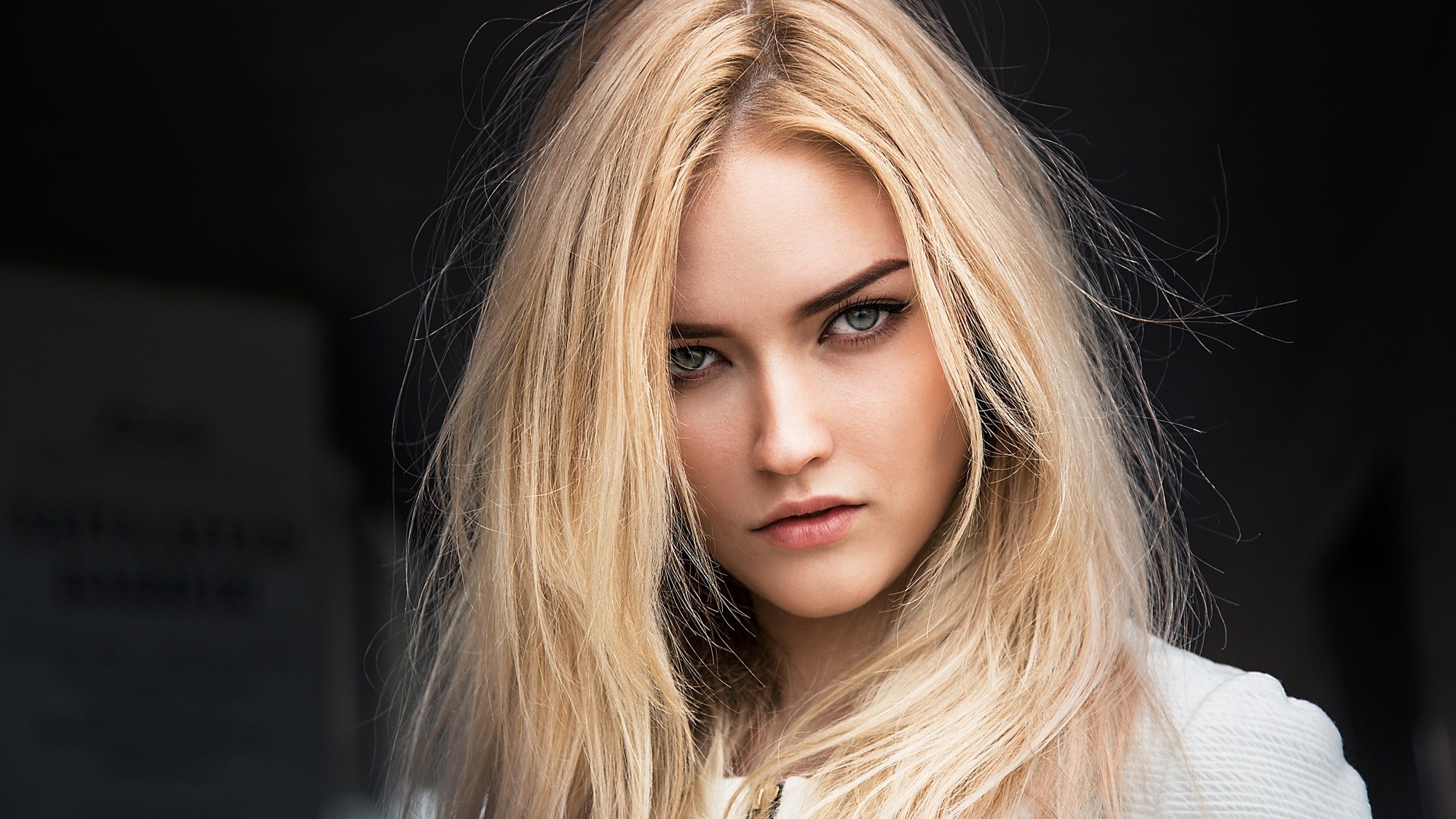 Portrait of a blonde woman with blue eyes HD Wallpaper