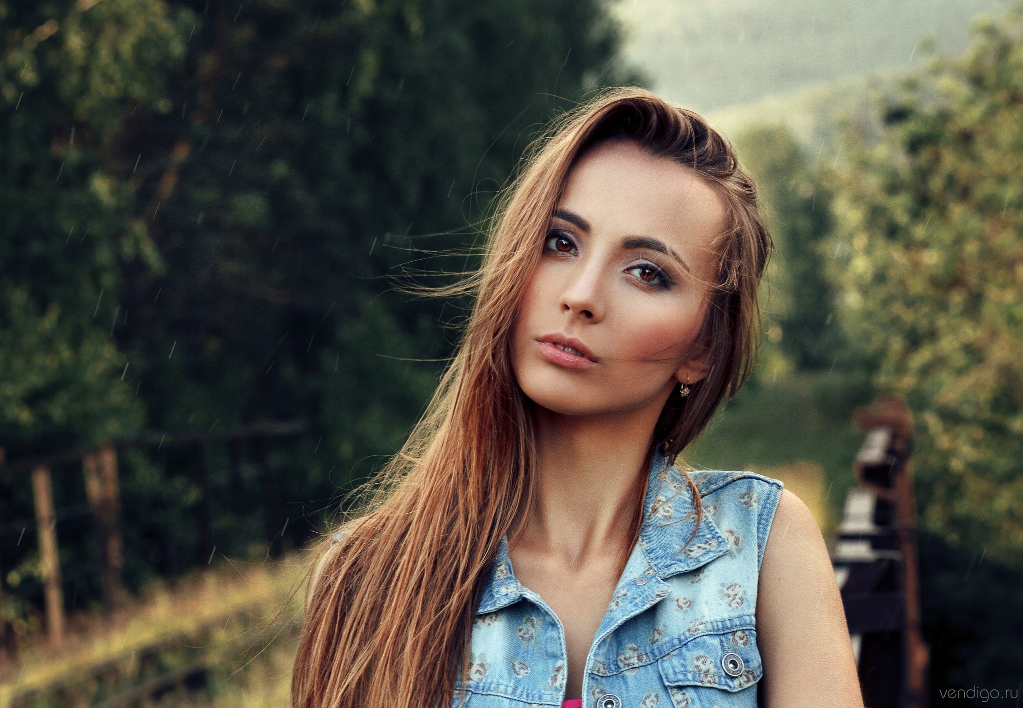 Woman in denim vest outdoors in the rain HD Wallpaper