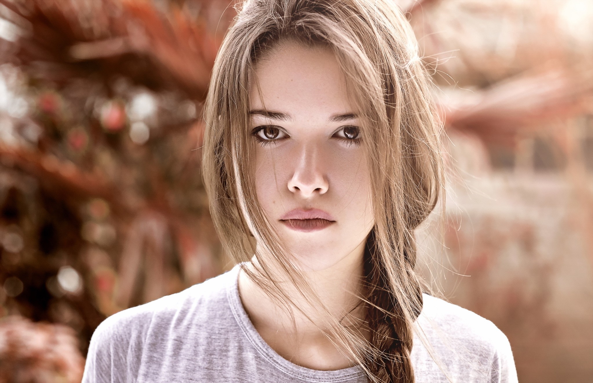 Woman with braided hair looking at the viewer HD Wallpaper