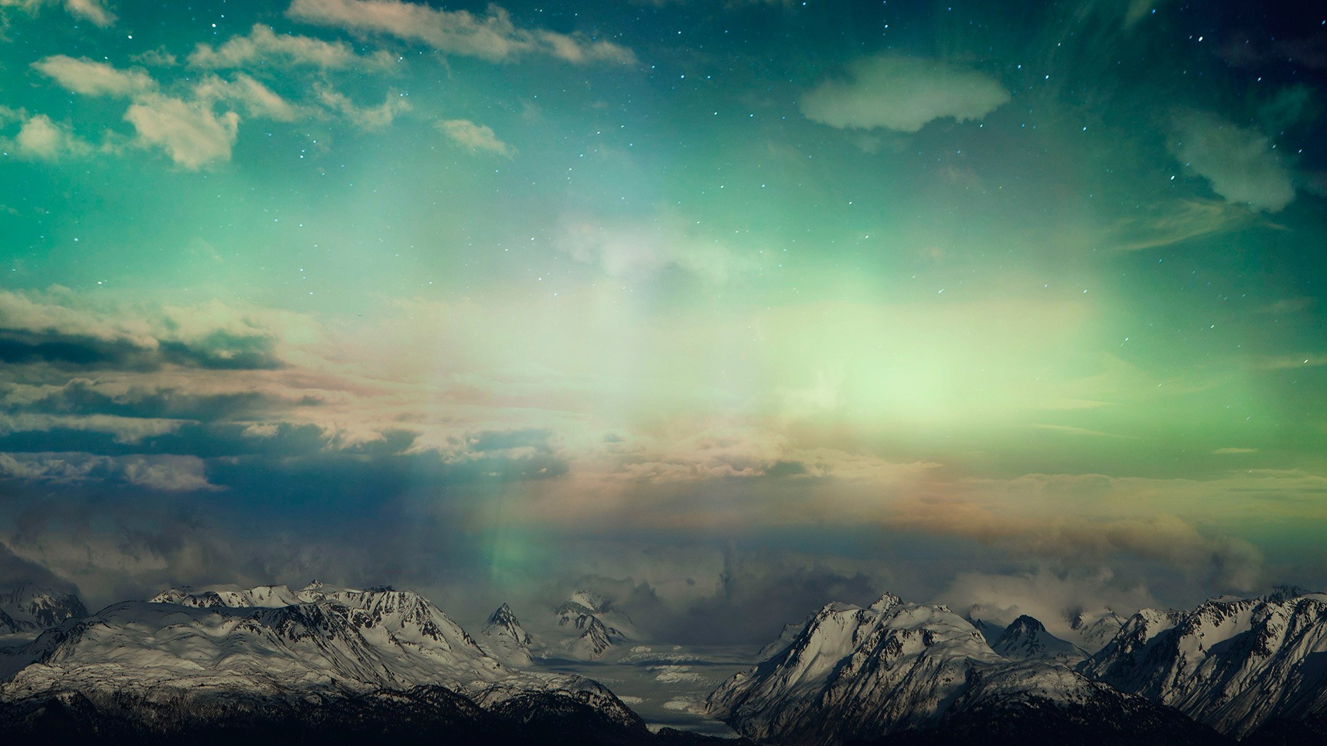 Aurora Borealis over snow-capped mountains HD Wallpaper