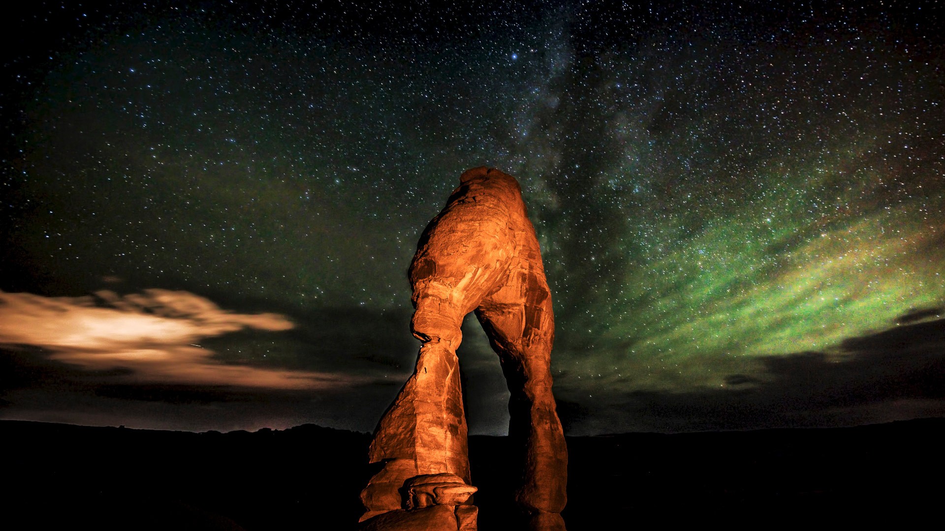 Delicate Arch under the stars at night HD Wallpaper