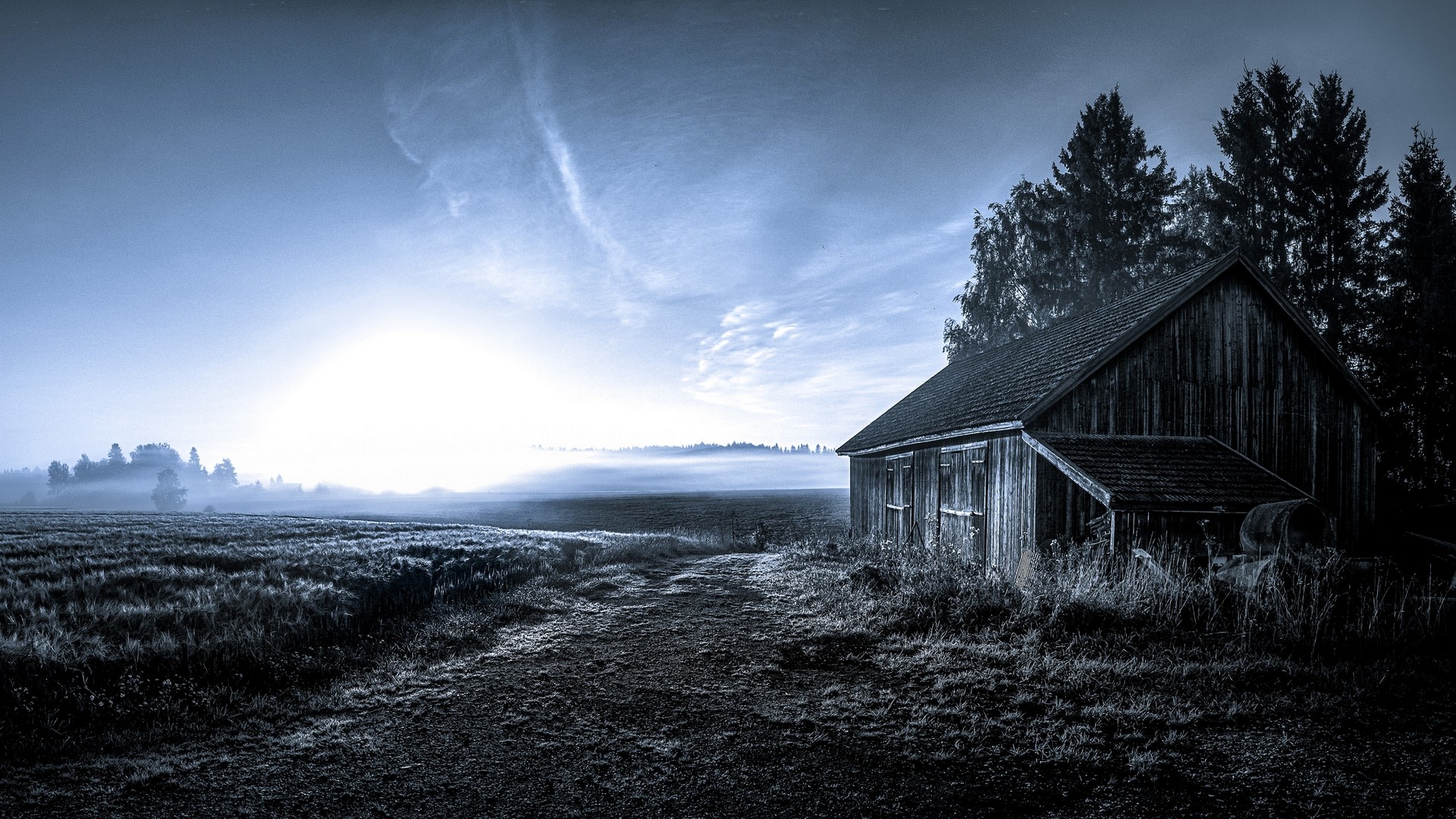 Barn in a misty field at sunrise HD Wallpaper