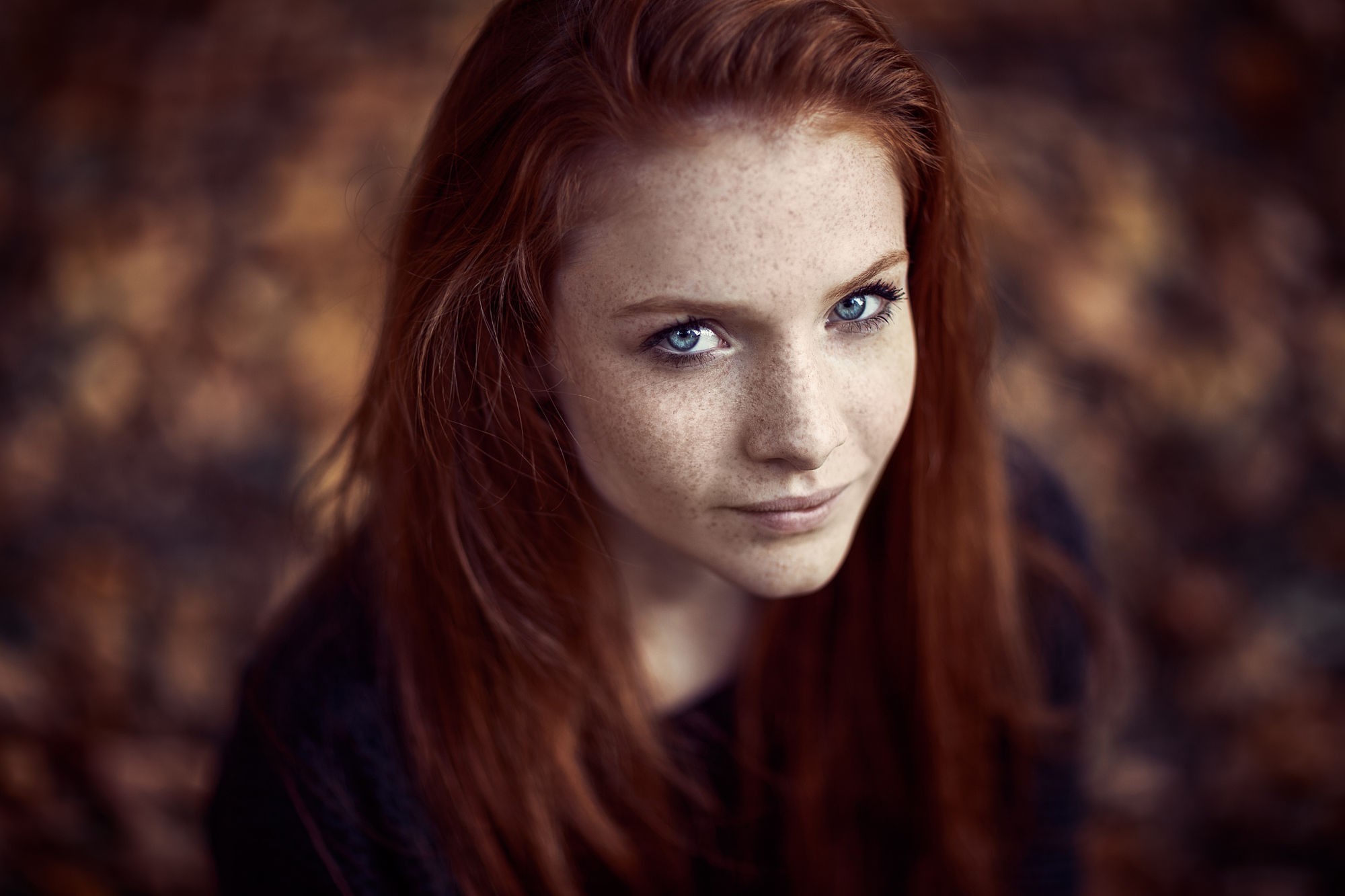 Redhead woman with blue eyes looking at viewer HD Wallpaper