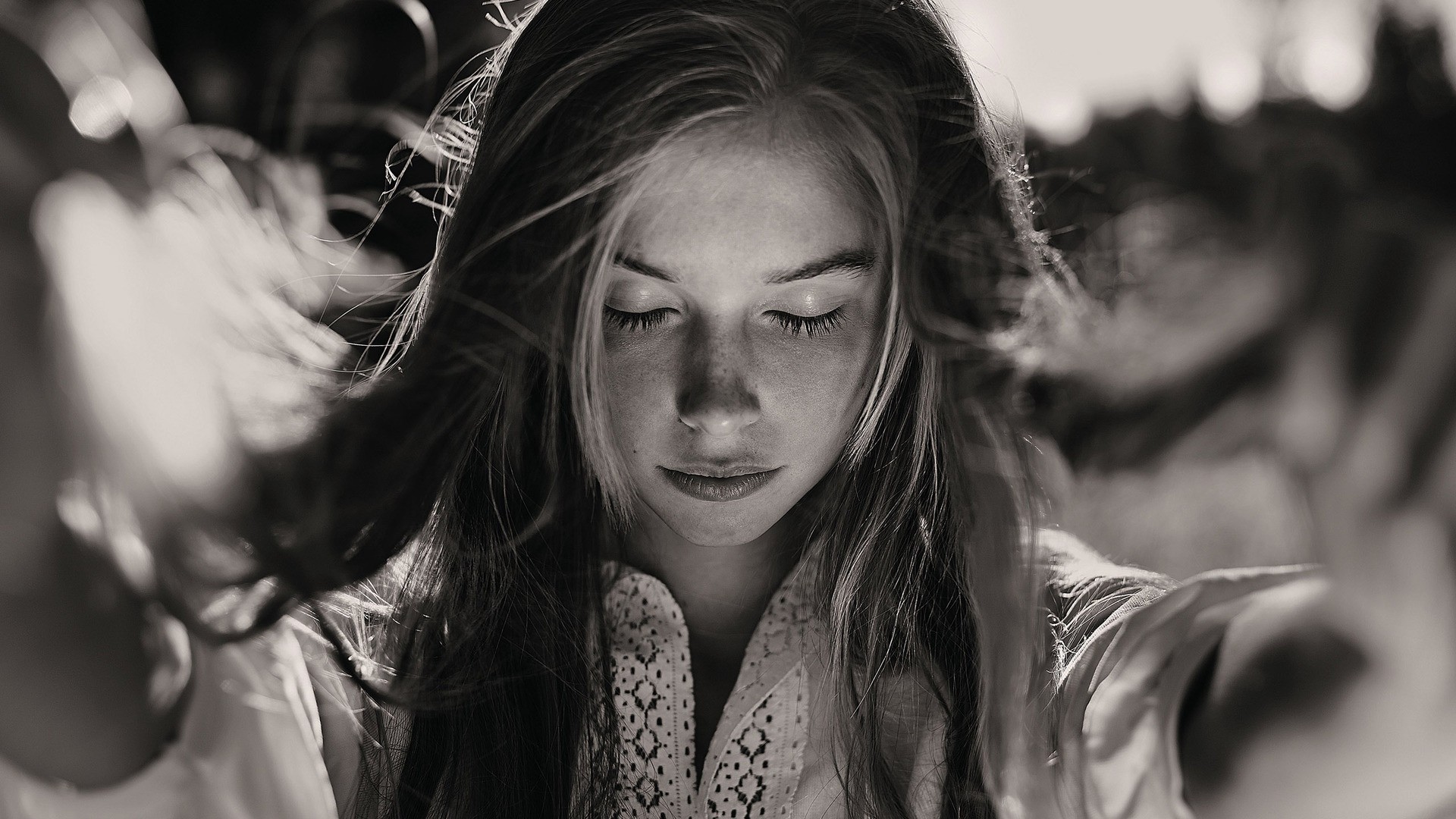 Black and white portrait of a young woman with eyes closed HD Wallpaper