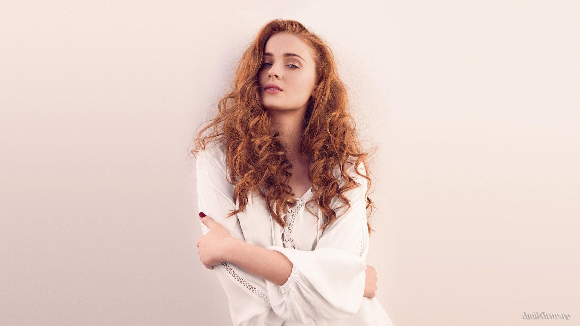 Sophie Turner with long curly red hair HD Wallpaper