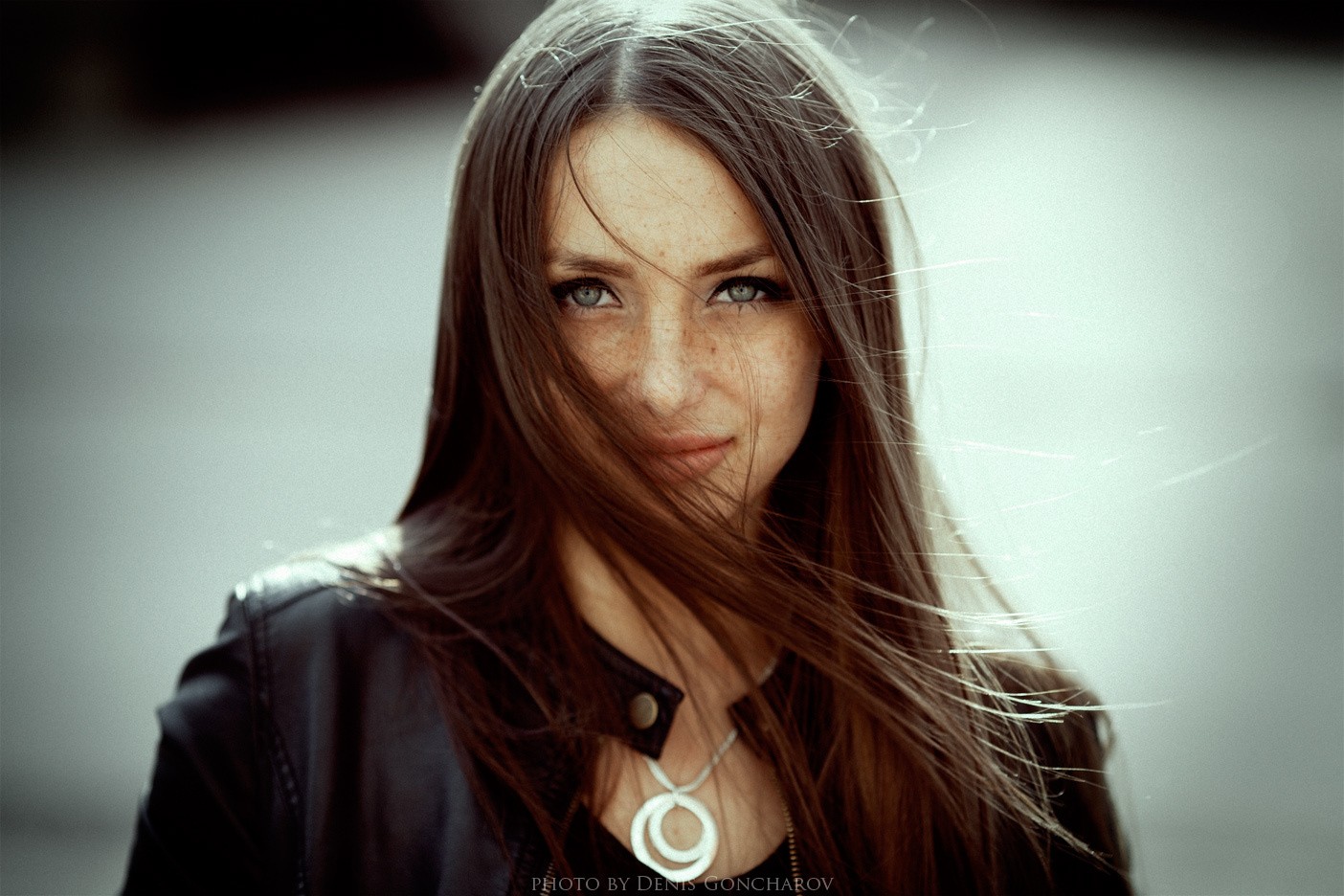 Portrait of a woman with hair in her face by Denis Goncharov HD Wallpaper
