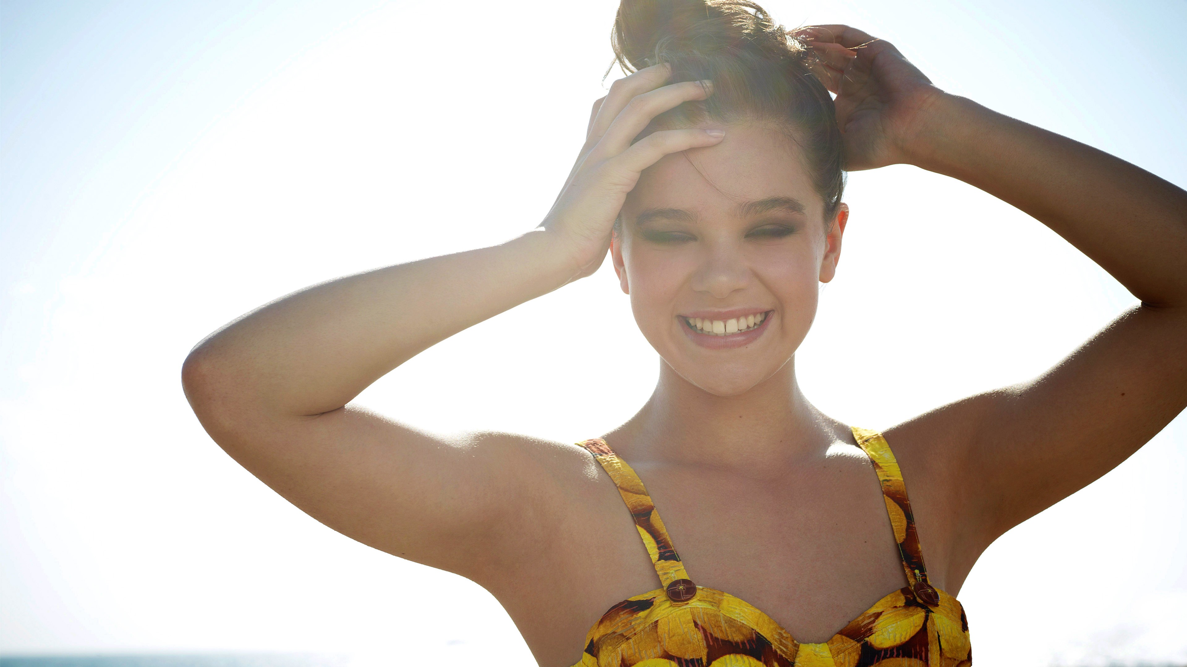 Hailee Steinfeld in a yellow floral bikini HD Wallpaper