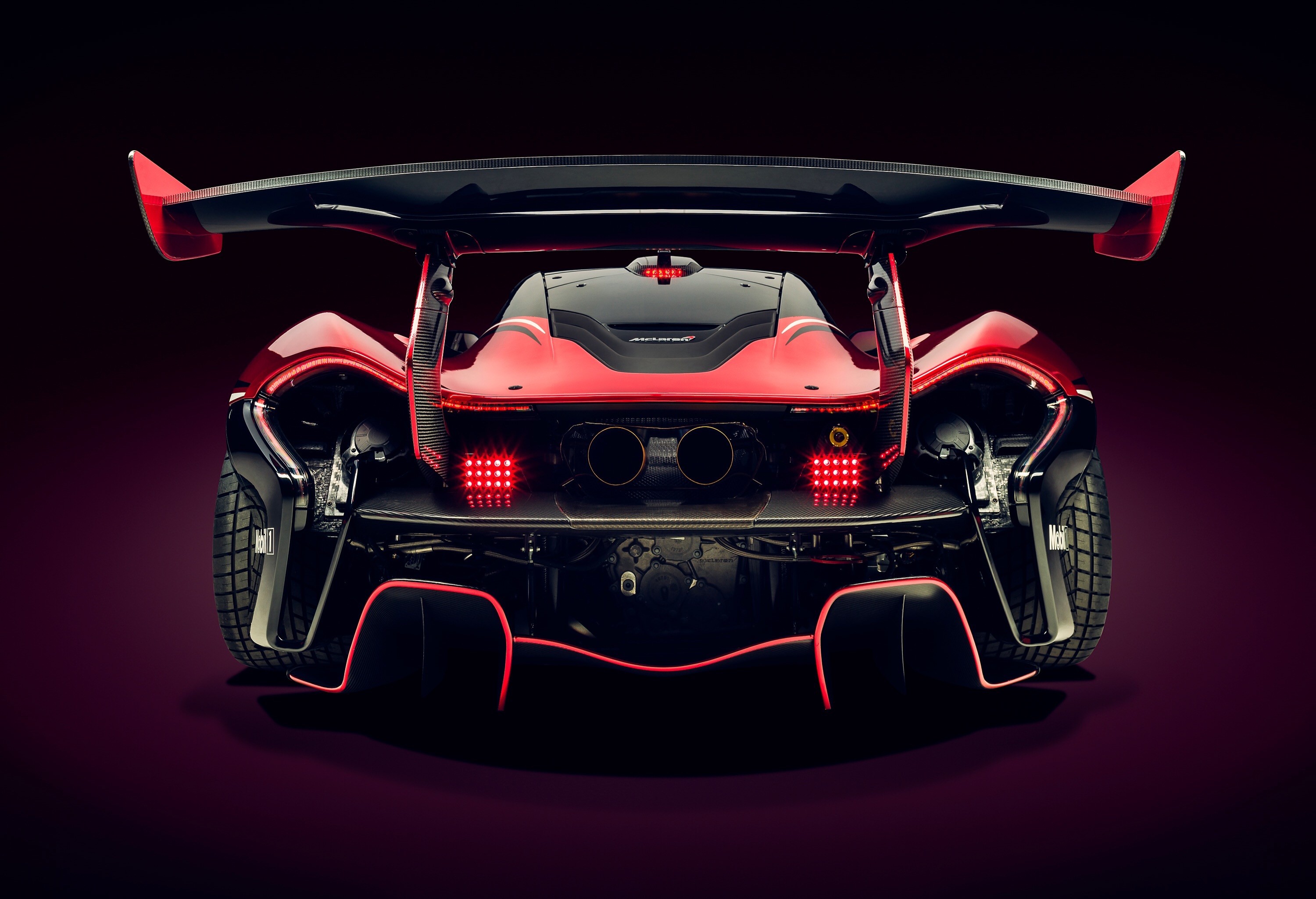 Rear view of a red McLaren P1 HD Wallpaper