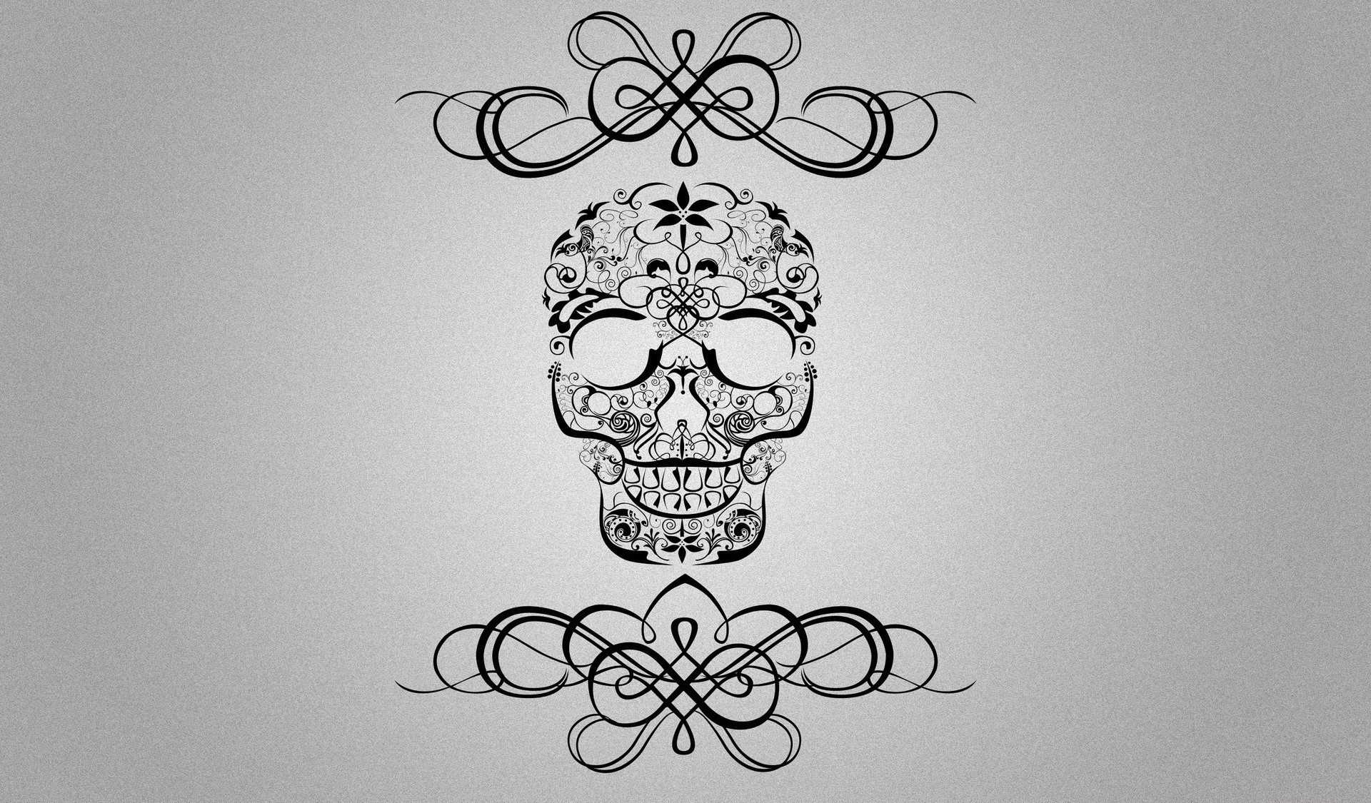 Ornate black skull with decorative flourishes HD Wallpaper