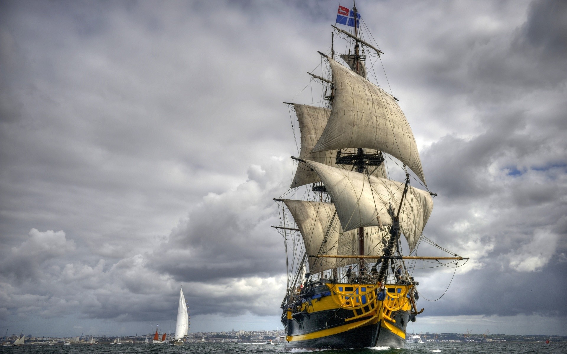 Sailing ship with sails up on a cloudy day HD Wallpaper