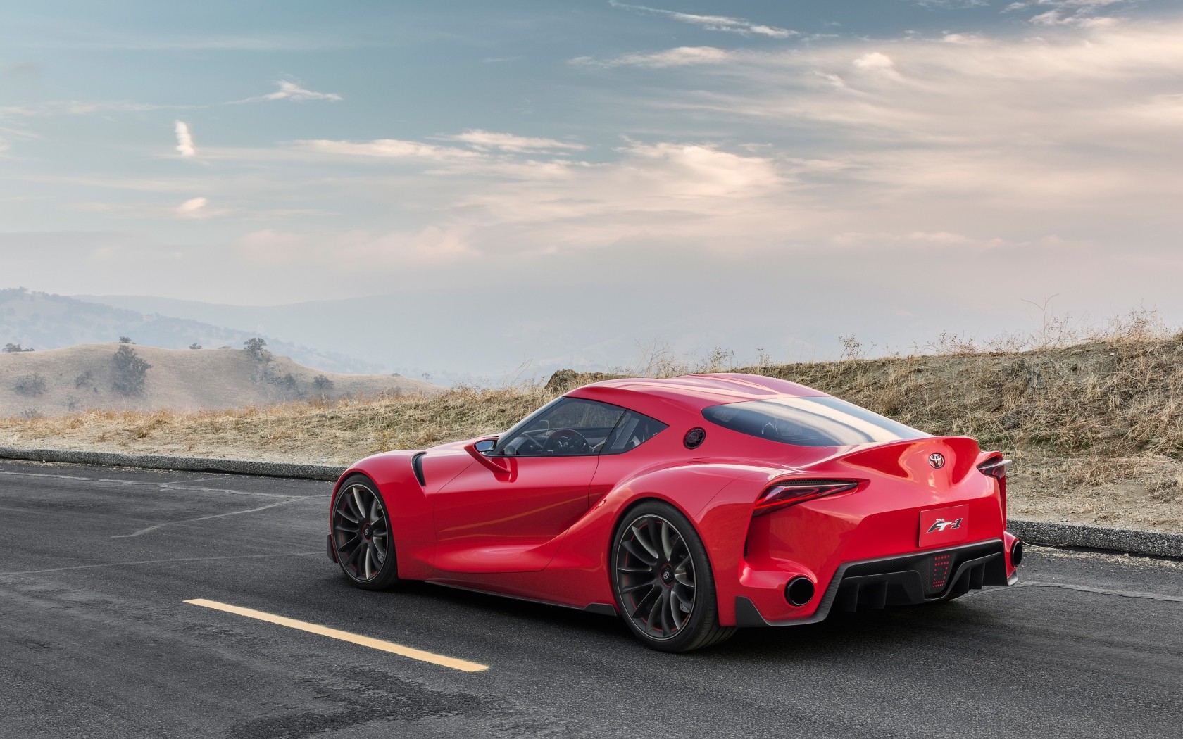 Red Toyota FT-1 Concept Car on a Road HD Wallpaper