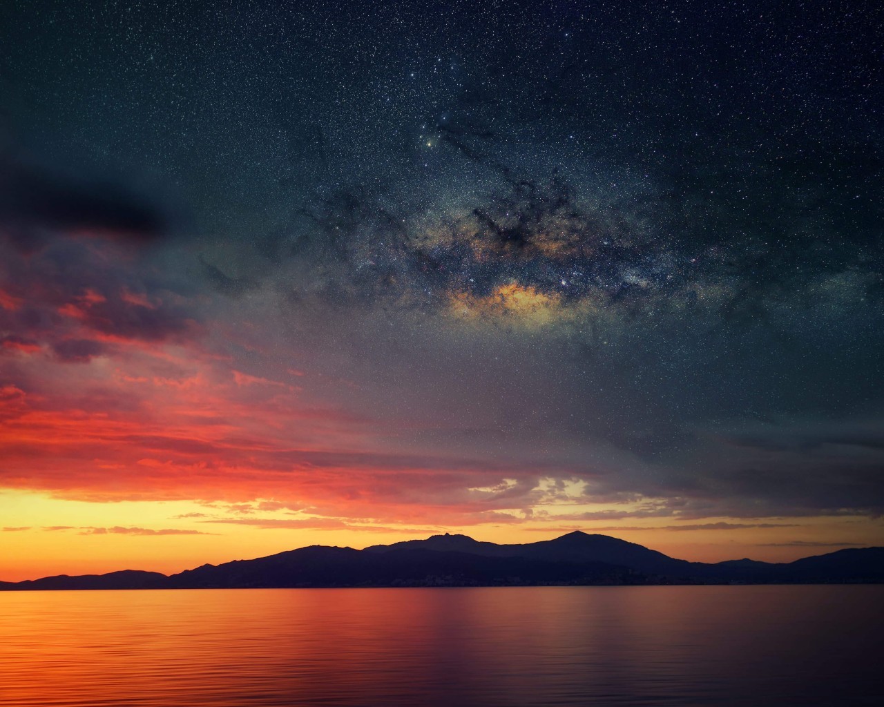 Milky Way over a lake at sunset HD Wallpaper