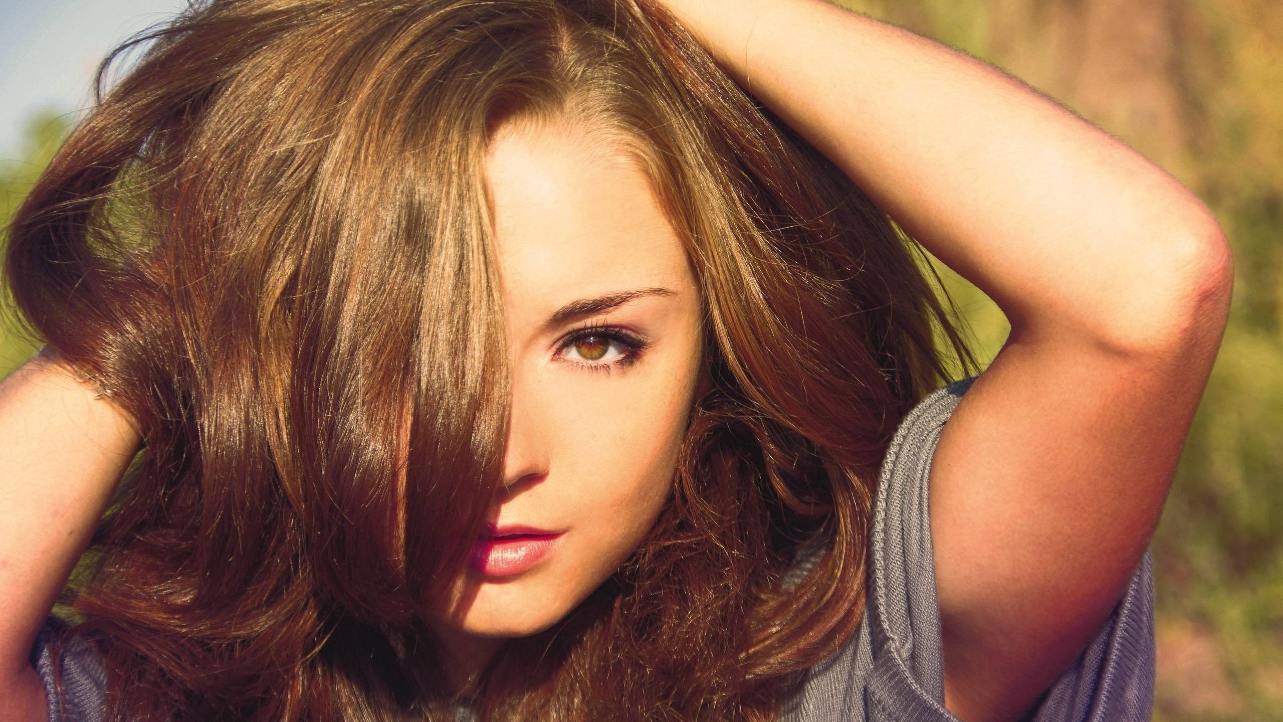 Woman with long brown hair and brown eyes HD Wallpaper