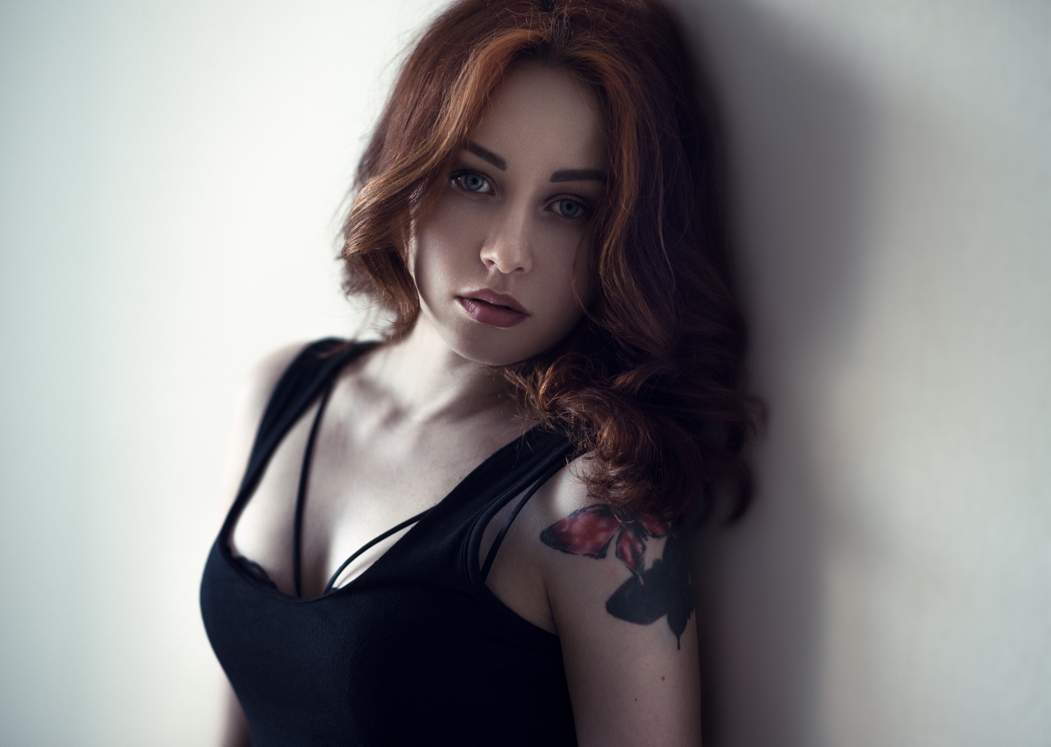 Woman with red hair and butterfly tattoo HD Wallpaper