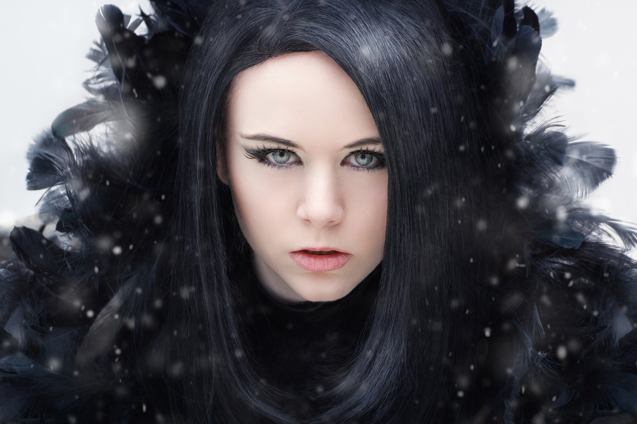 Woman with black hair and black feathers HD Wallpaper