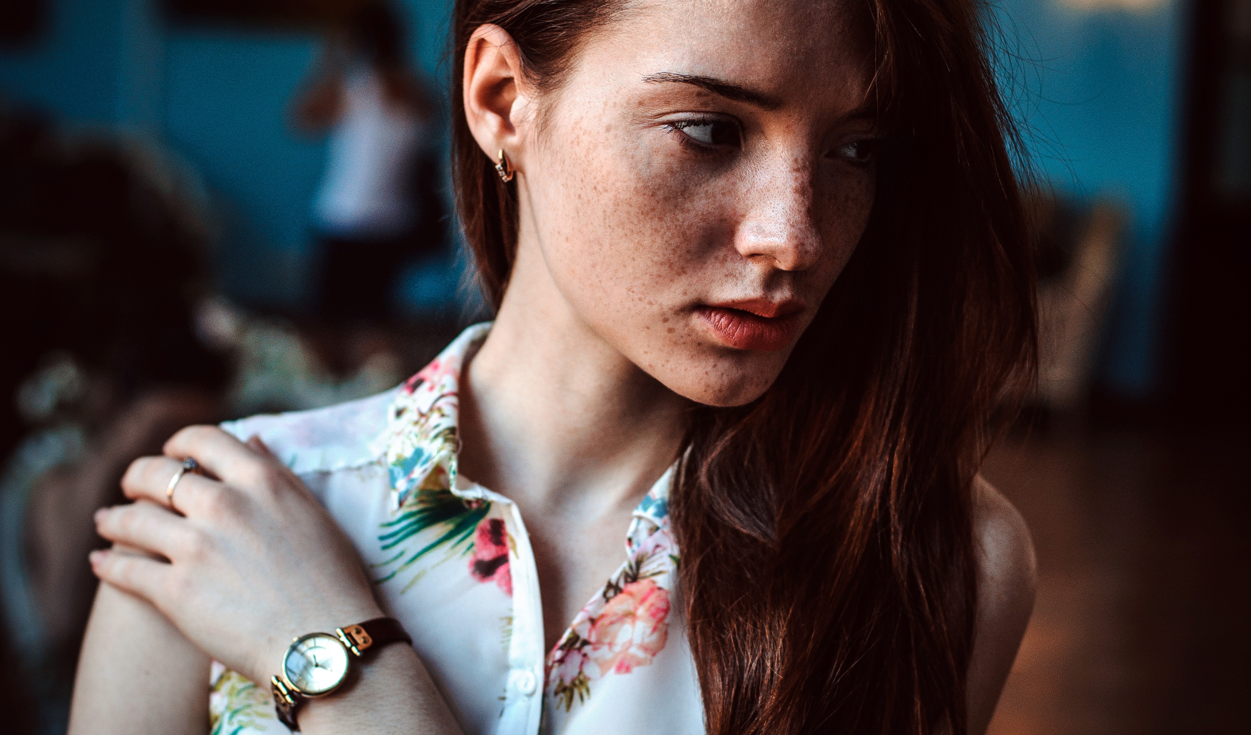 Woman with freckles wearing a floral shirt HD Wallpaper