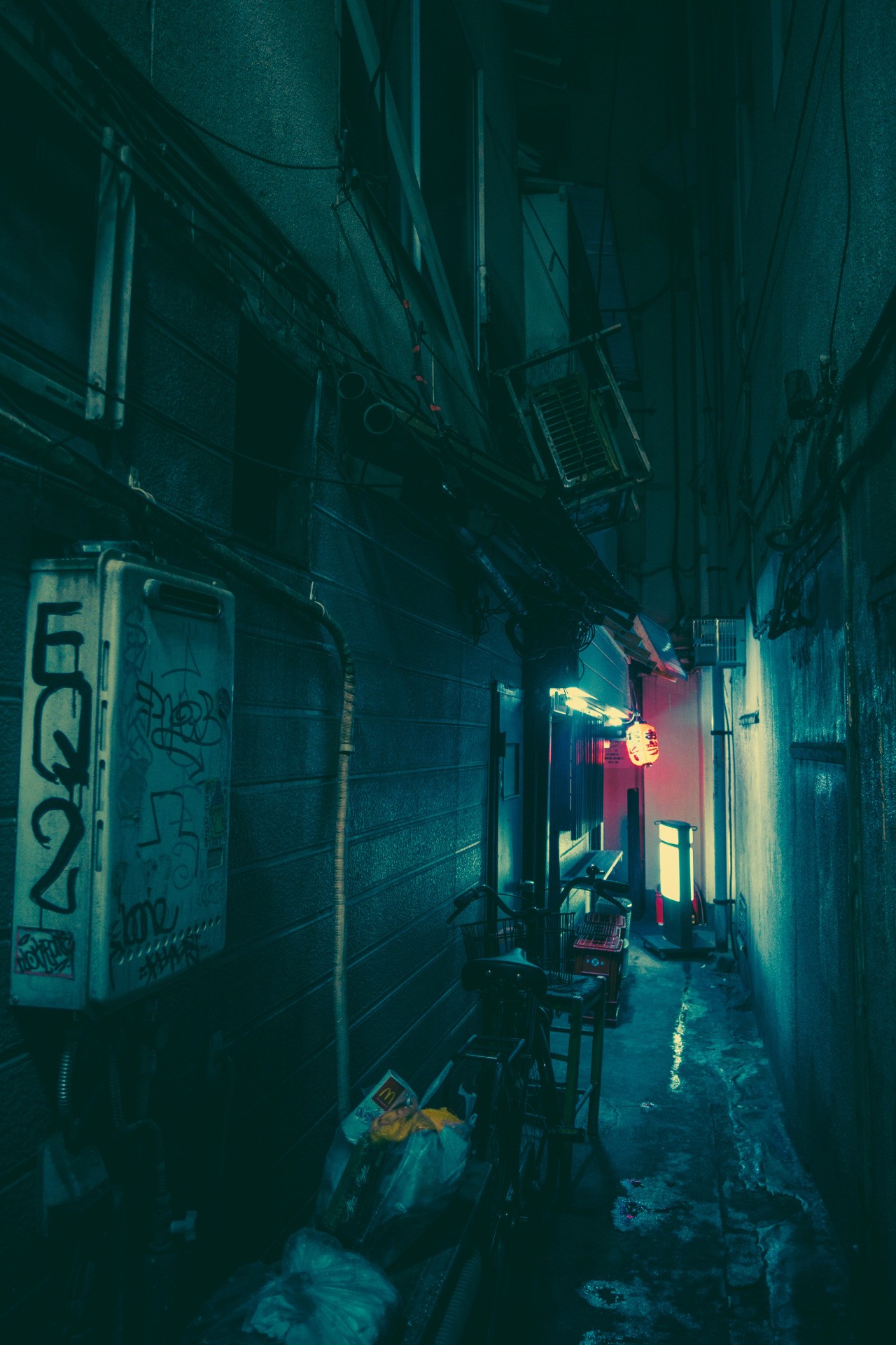 Night alley in Japan with graffiti and trash HD Wallpaper
