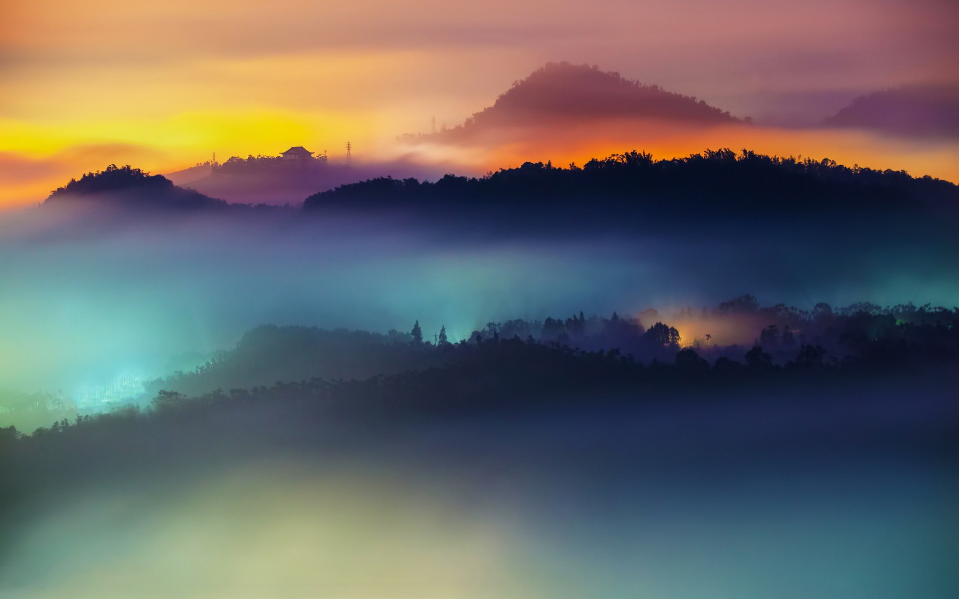 Misty mountains at sunrise with colorful sky HD Wallpaper